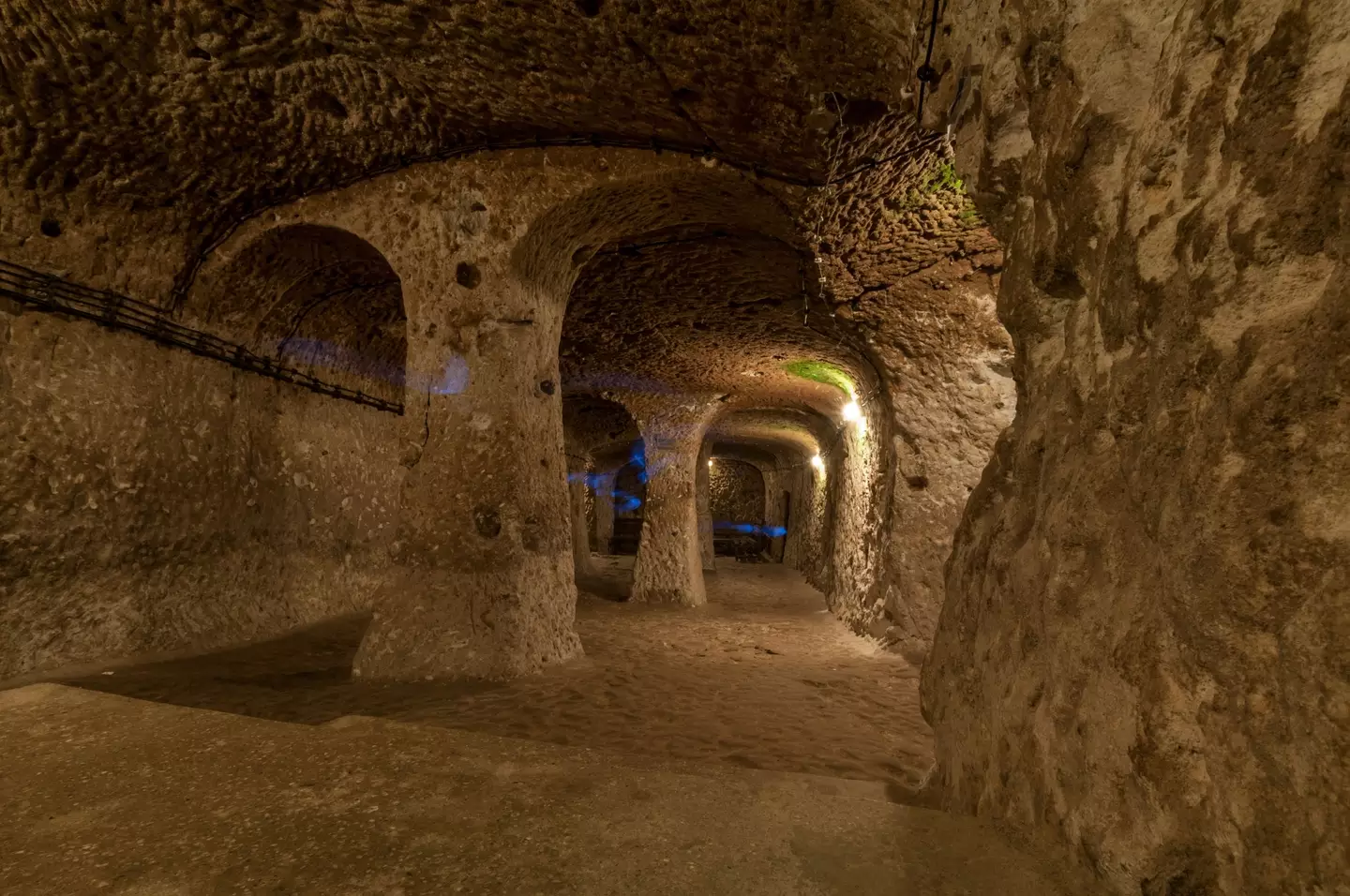 The man discovered an ancient city behind his walls.