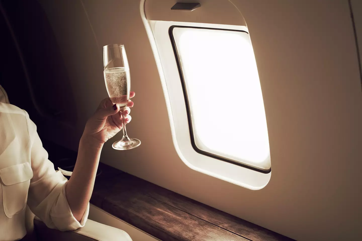 The expert says alcohol while flying is 'the biggest sin of travel'.