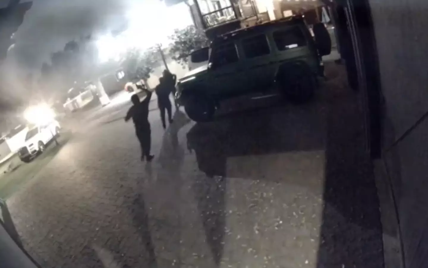 The men running from Amouranth's home after she opened fire (X / @amouranth)