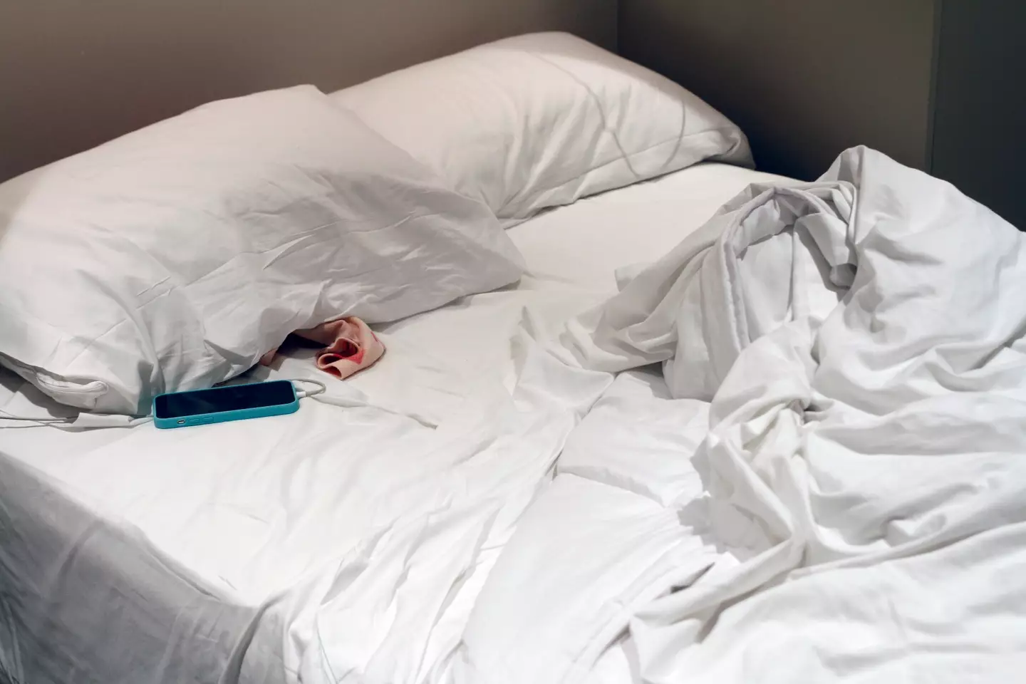 Charging it while you snooze might not be best in the long-run. (Getty Stock)
