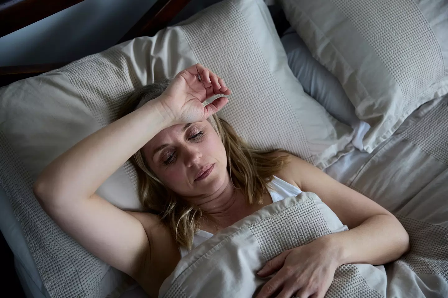 Night sweats might be easily dismissed in the summer months (HighwayStarz-Photography/Getty images)