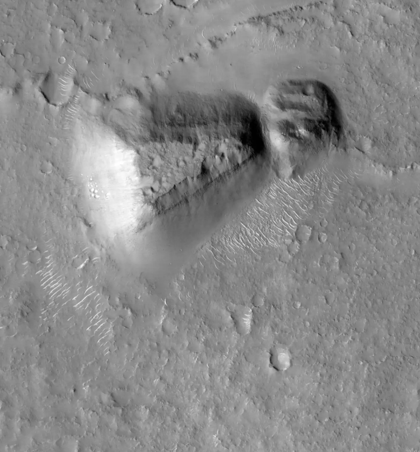 What do you think, man-made or naturally occurring? (NASA/JPL-Caltech/UArizona)