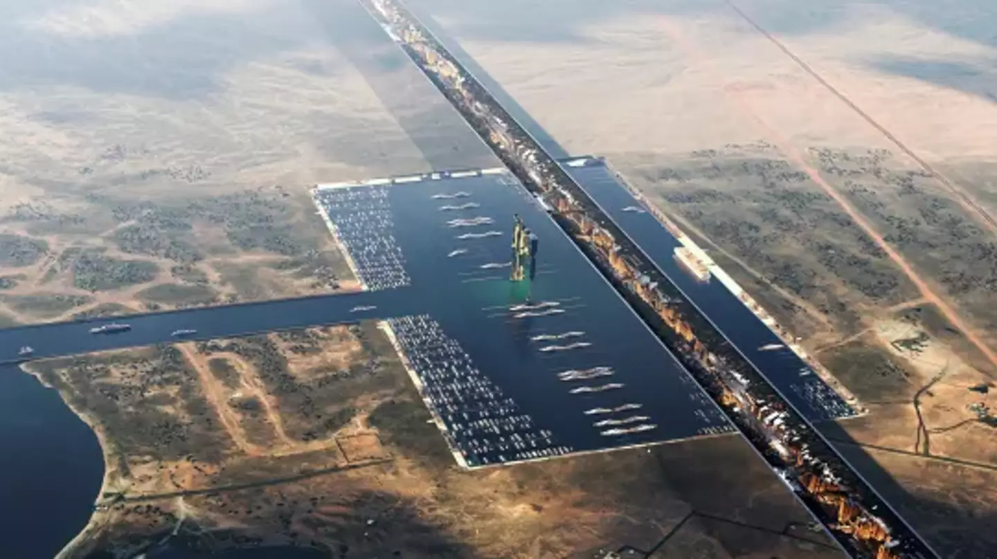 The aerial shot of the city shows buildings floating above the marina. (NEOM)