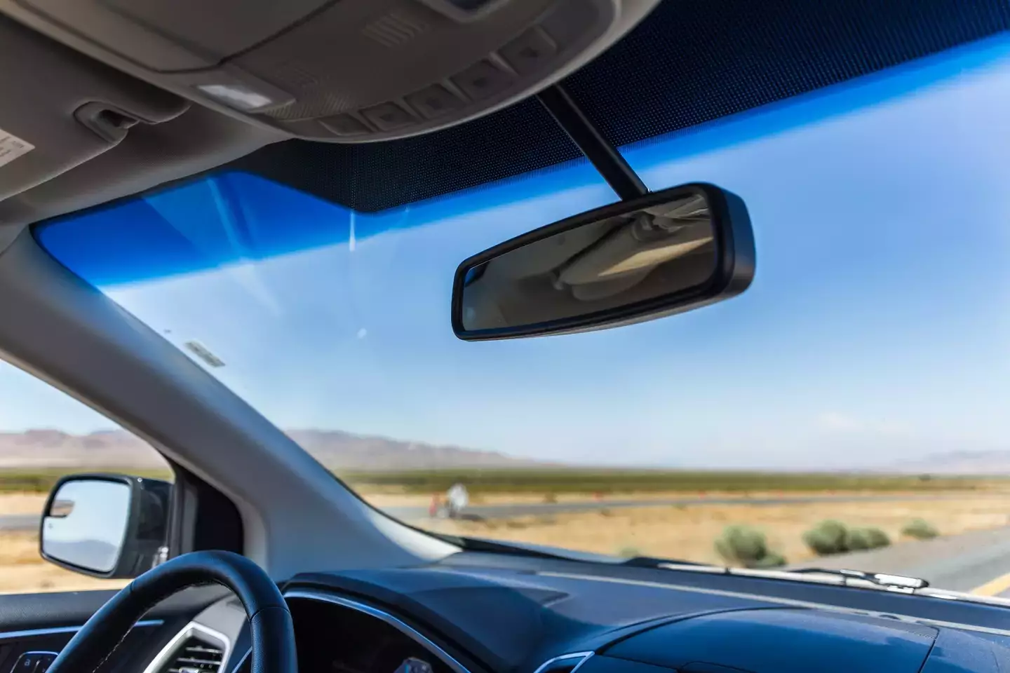 People are just discovering what the black dots on car windscreens are actually for 1 The black dots which line your windscreen have an important job to do (Getty Stock Image)