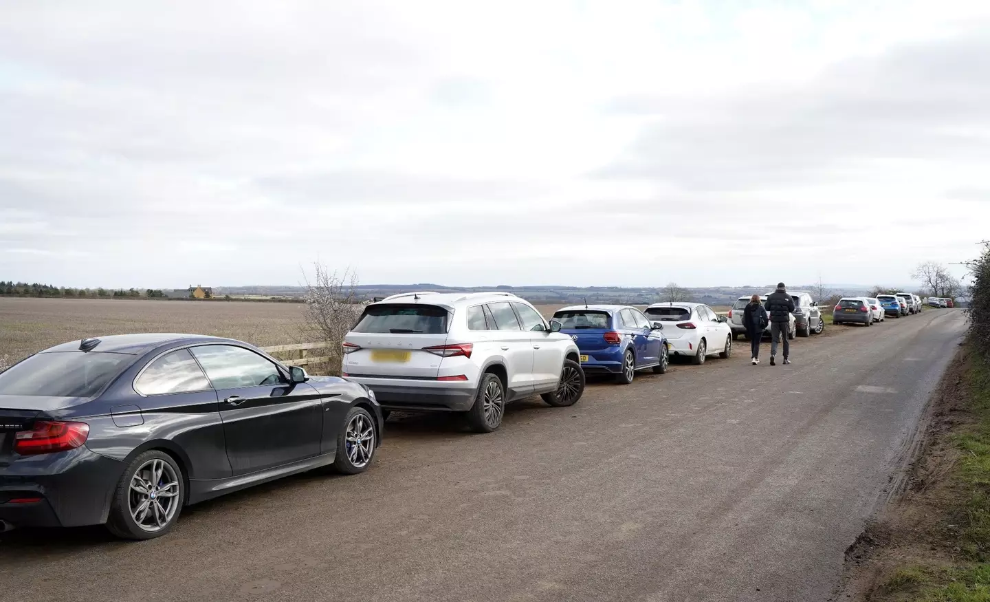 Cars were parked along the country lane in Chipping Norton.