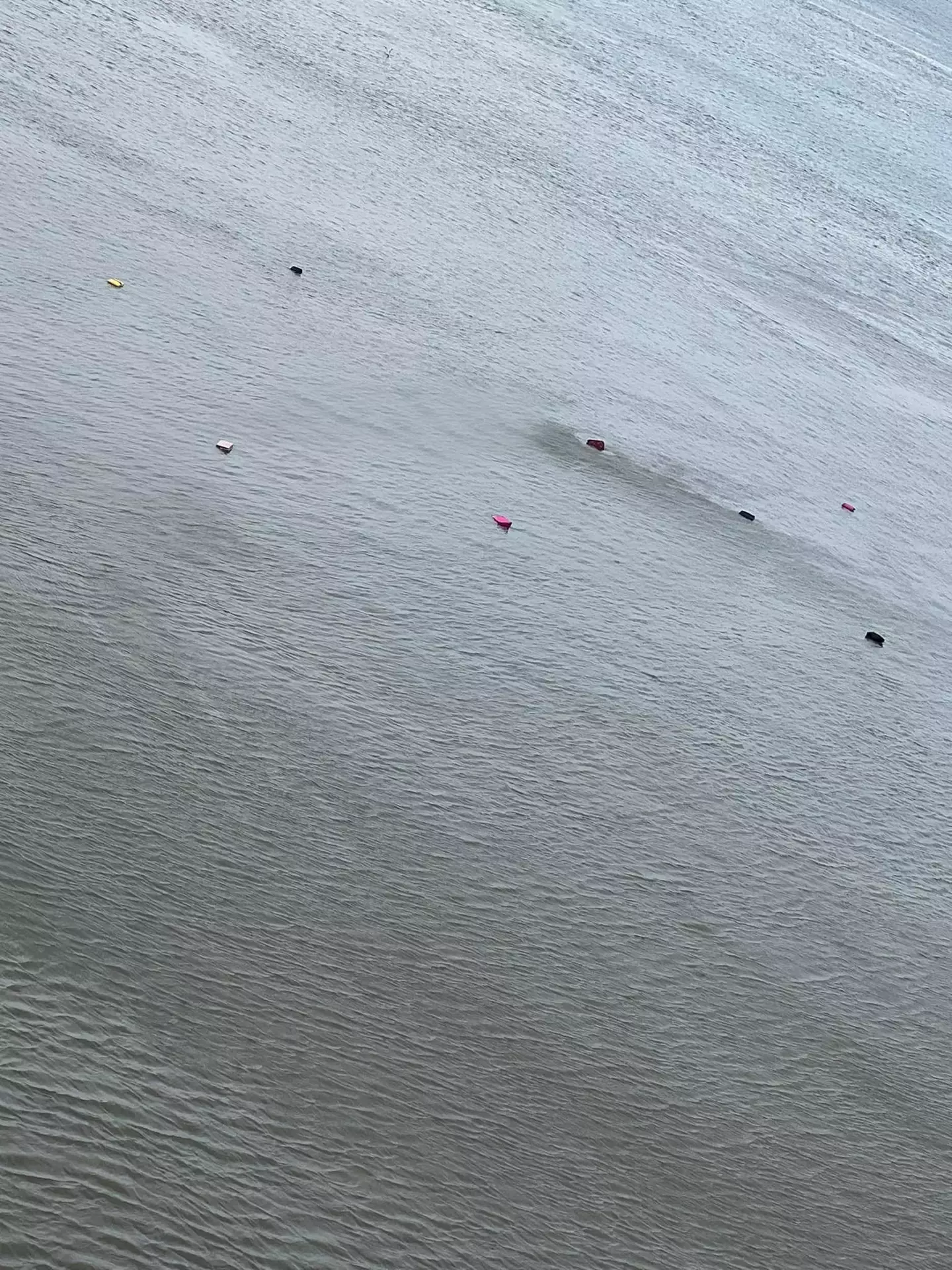Passengers spotted objects floating in the water while they prepared to disembark.
