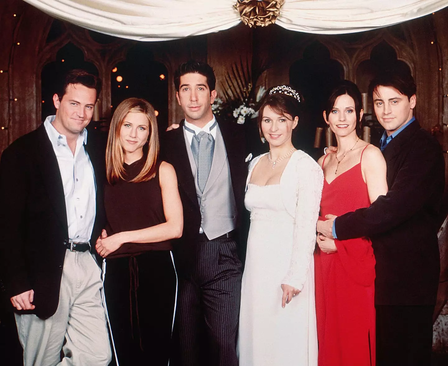 Helen Baxendale (the one in the middle that's not David Schwimmer) said she really enjoyed her time on Friends, but the fame made it hard to live a normal life. (Oliver Upton/NBCU Photo Bank/NBCUniversal via Getty Images)
