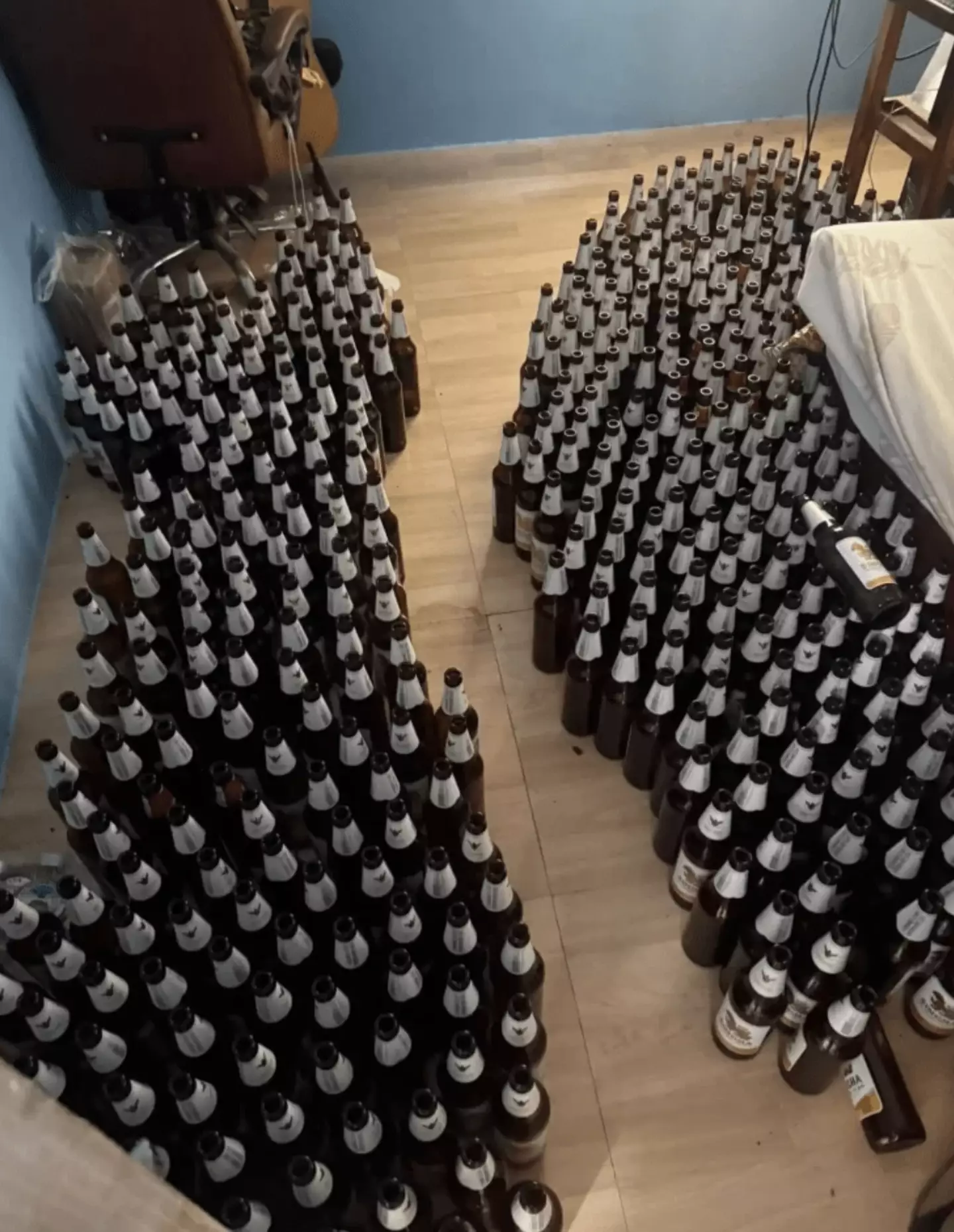 A collection of beer bottles were found laid out next to his bed (Facebook)