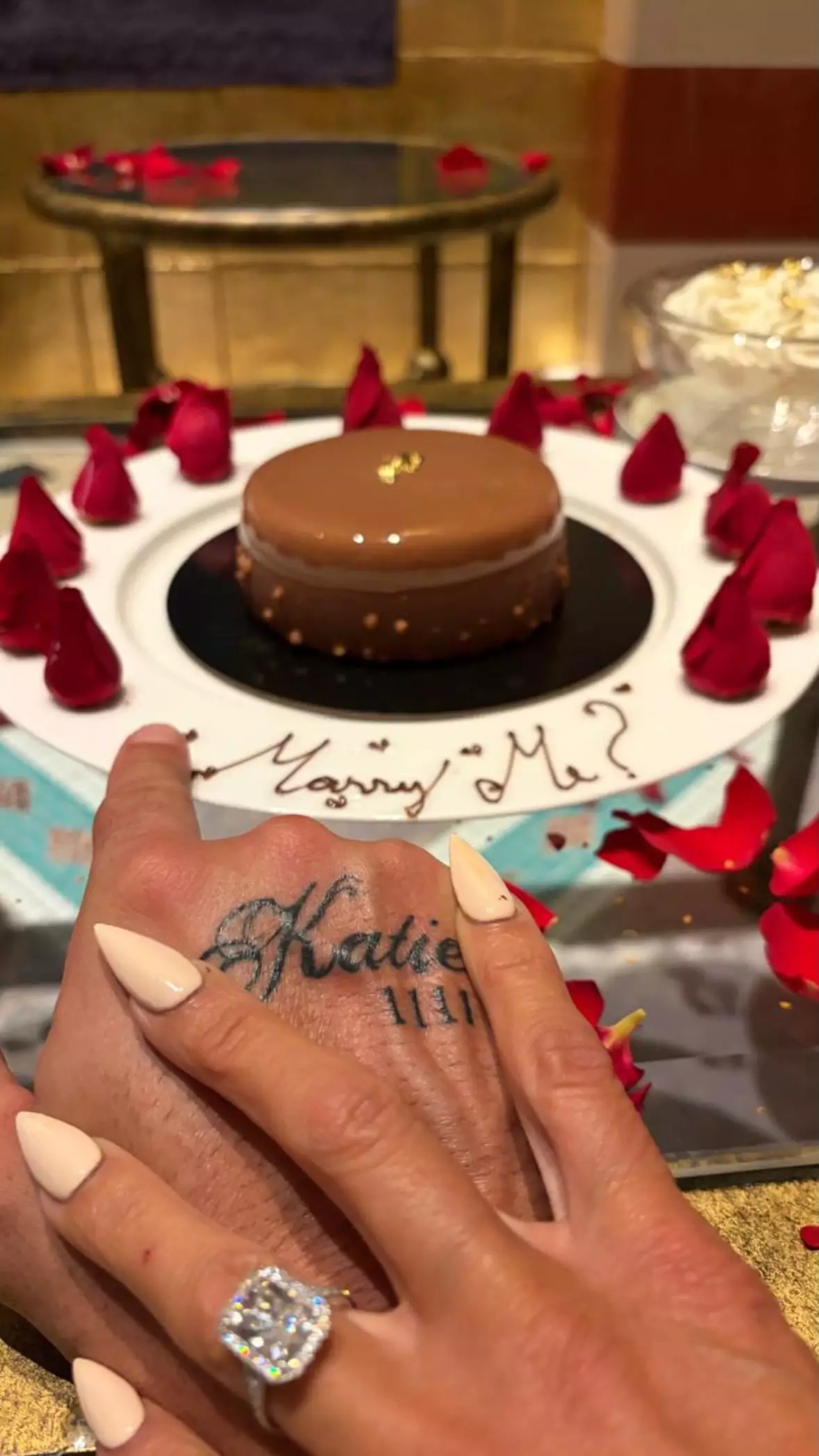 Katie's new beau appears to have her name tattooed on his hand (Instagram/@katieprice)