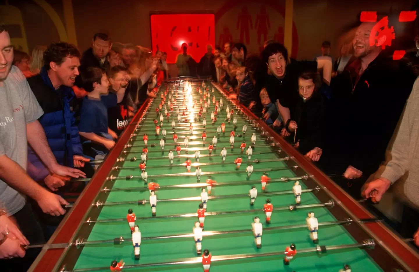 Visitors enjoy a game of giant fussball table inside The Millennium Dome (Richard Baker / In Pictures via Getty Images Images)
