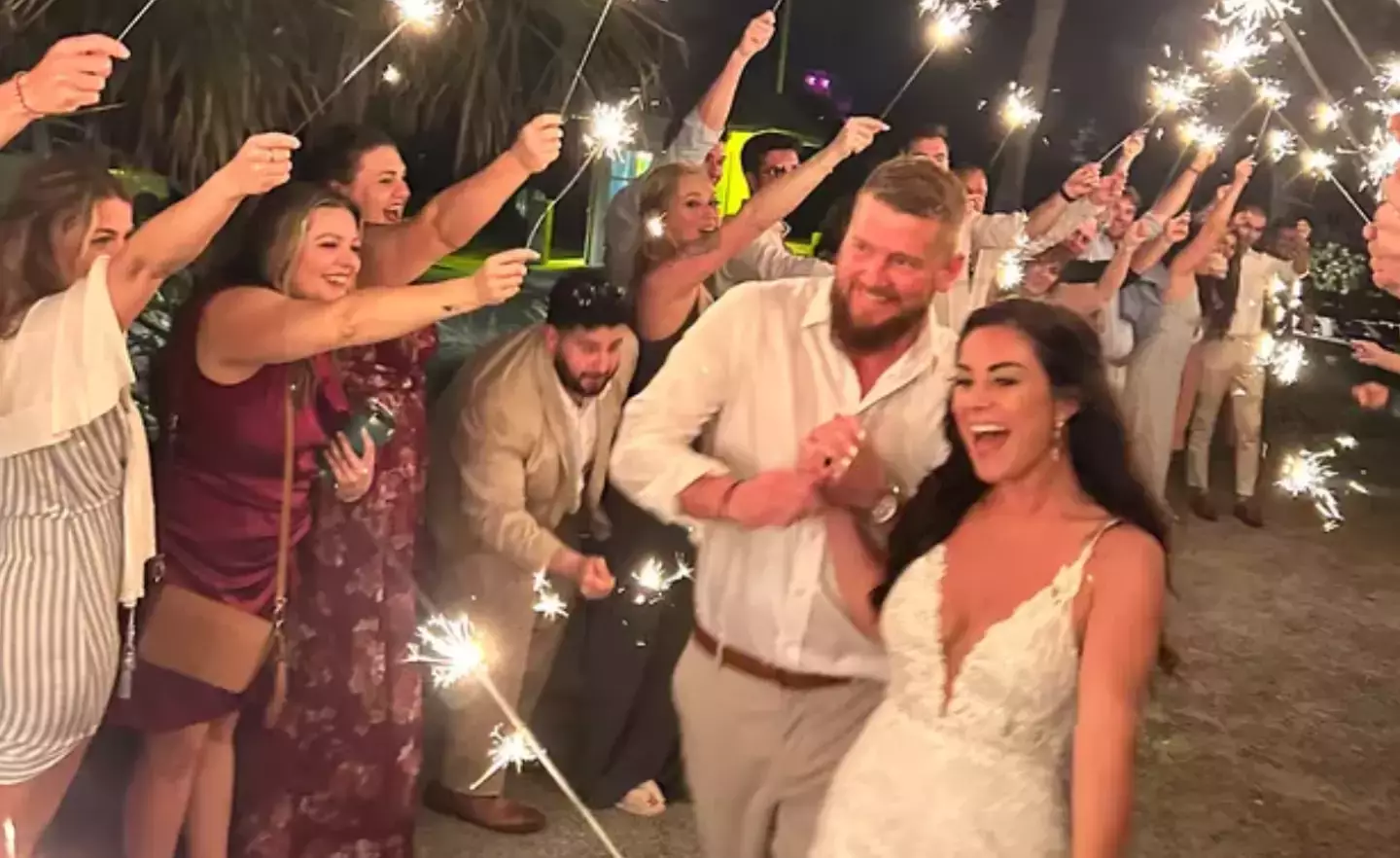 Samantha Miller and Aric Hutchinson on their wedding day (GoFundMe)