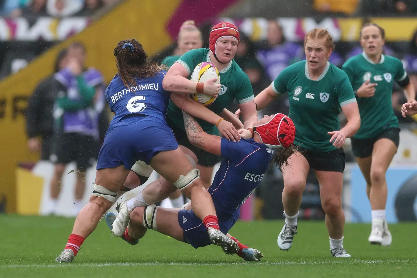 Aoife Wafer pictured being tackled by Axelle Berthoumieu and Charlotte Escudero during the game (Alex Davidson - World Rugby/World Rugby via Getty Images)