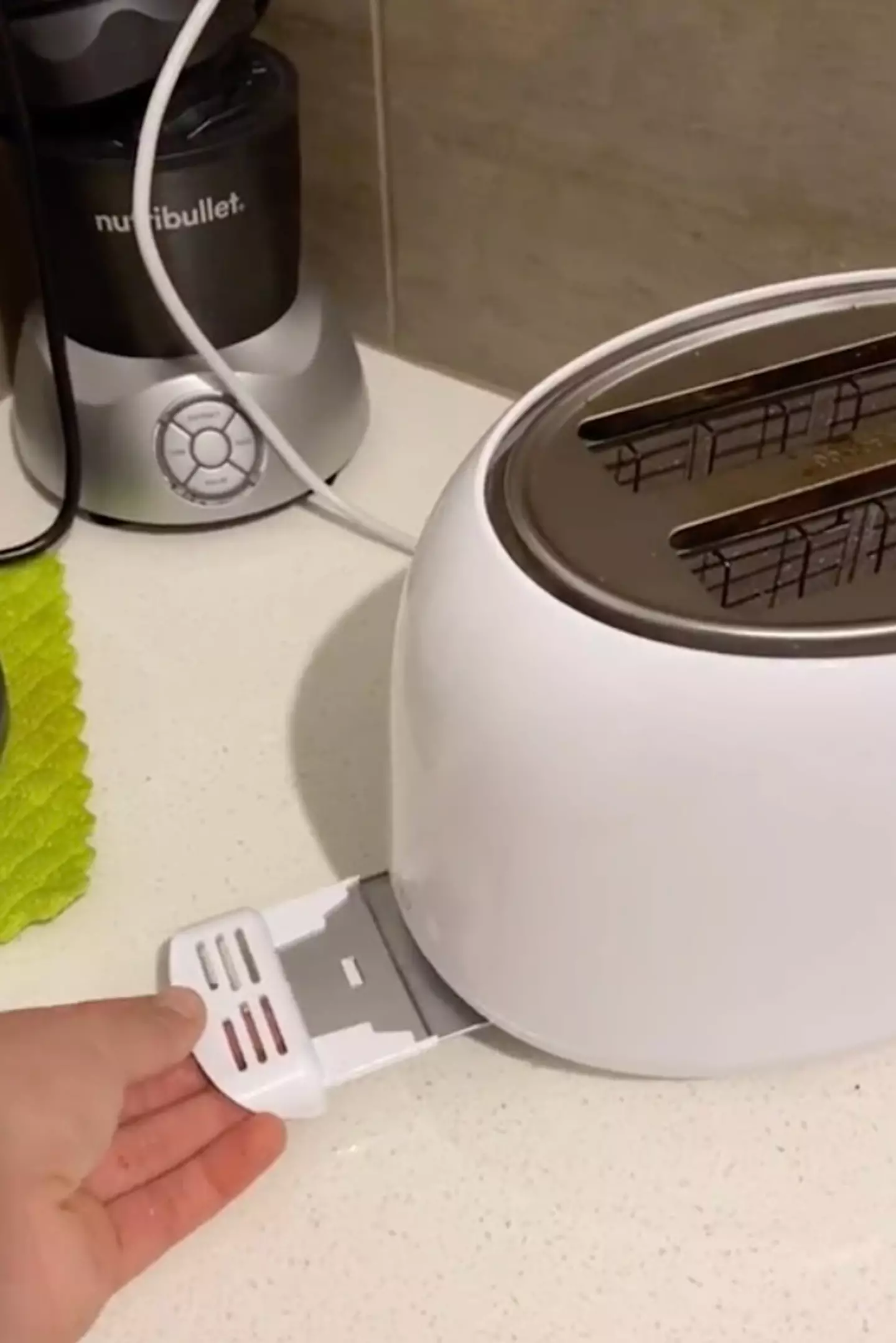 The toaster tray catches crumbs and makes it easier to clean the appliance.