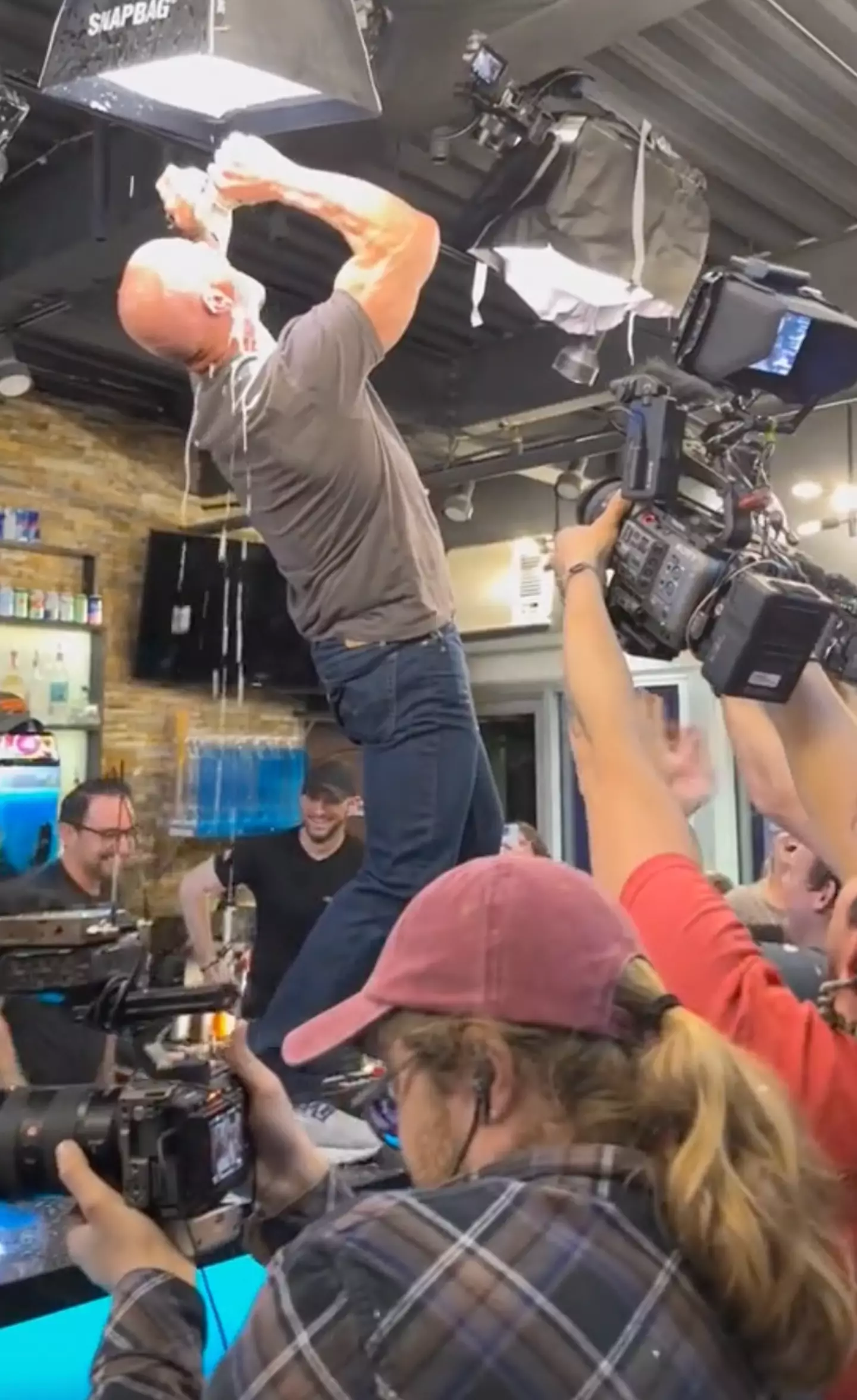 'Stone Cold' Steve Austin has surprised guests at a bar by doing an iconic beer chug.