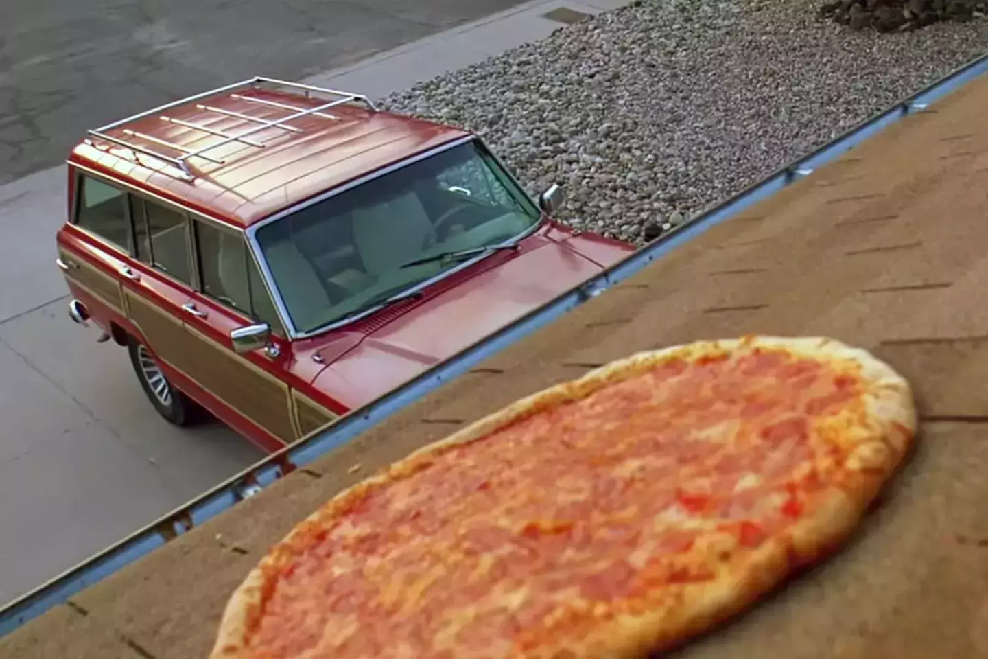 The 'pizza on the roof' scene has caused the homeowners plenty of bother after lots of people tried doing it themselves (AMC)