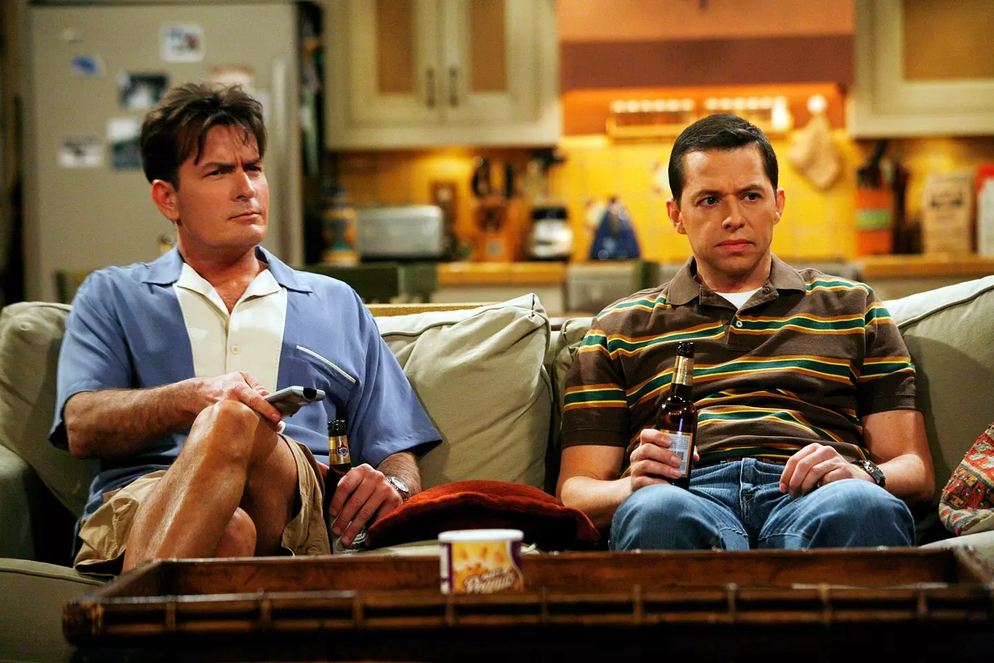 Charlie and Alan on the couch in the CBS sitcom (Greg Gayne/CBS via Getty Images)