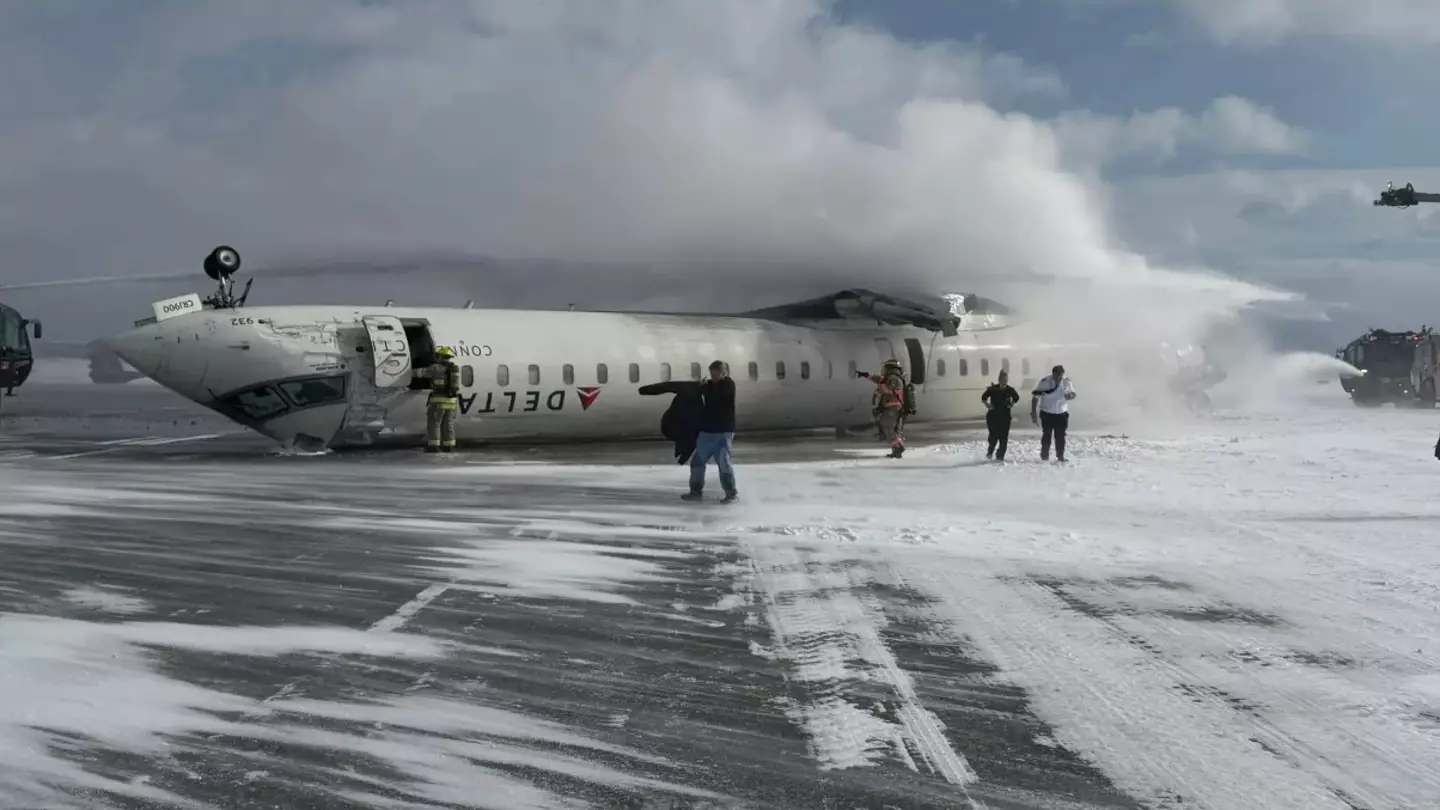 Delta Air Lines crash survivor posts harrowing upside-down photo from inside plane after crash landing in Canada