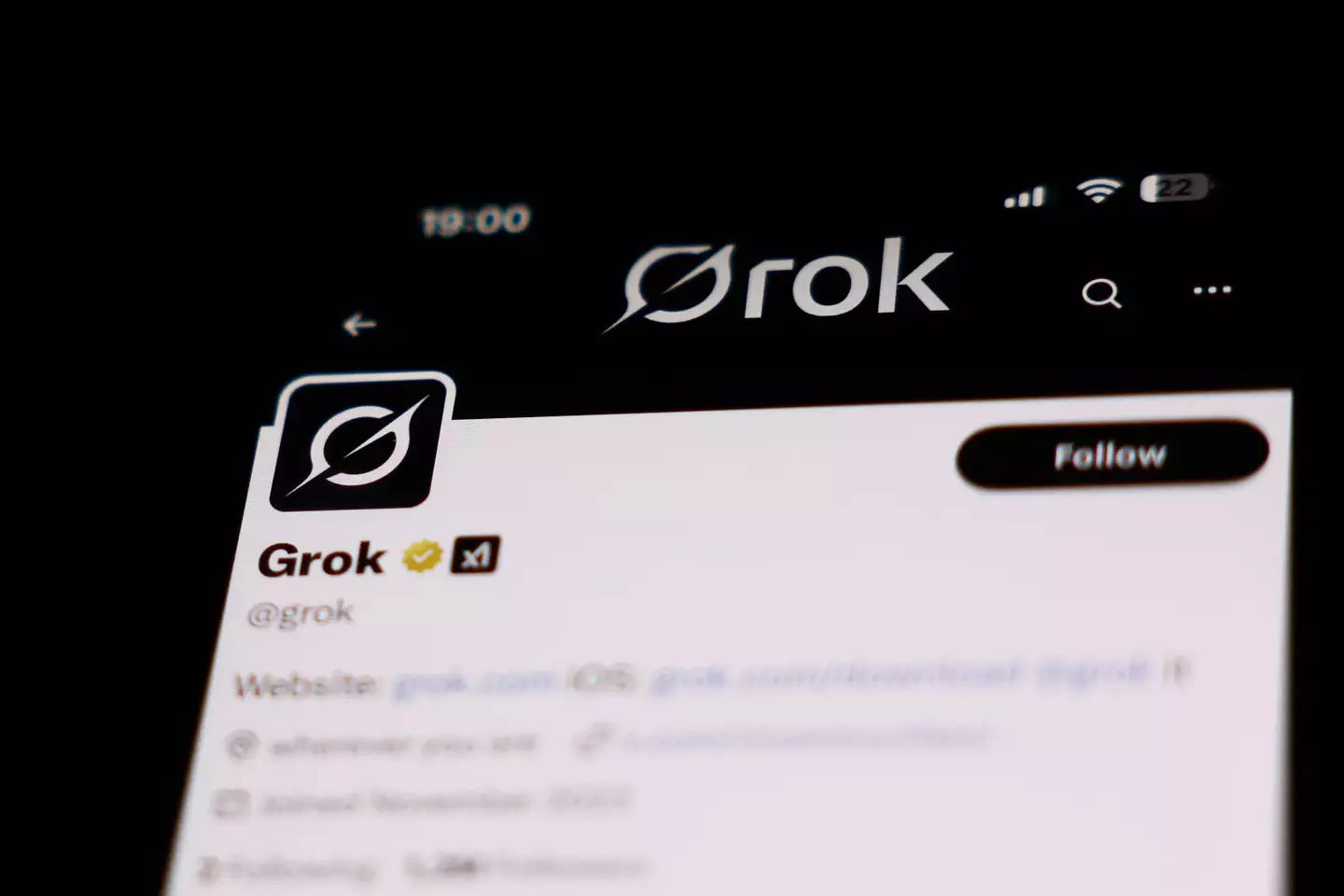 Grok is Elon Musk's AI which you can use on X, and people have been using it to create explicit images of people without their consent (Jakub Porzycki/NurPhoto via Getty Images)