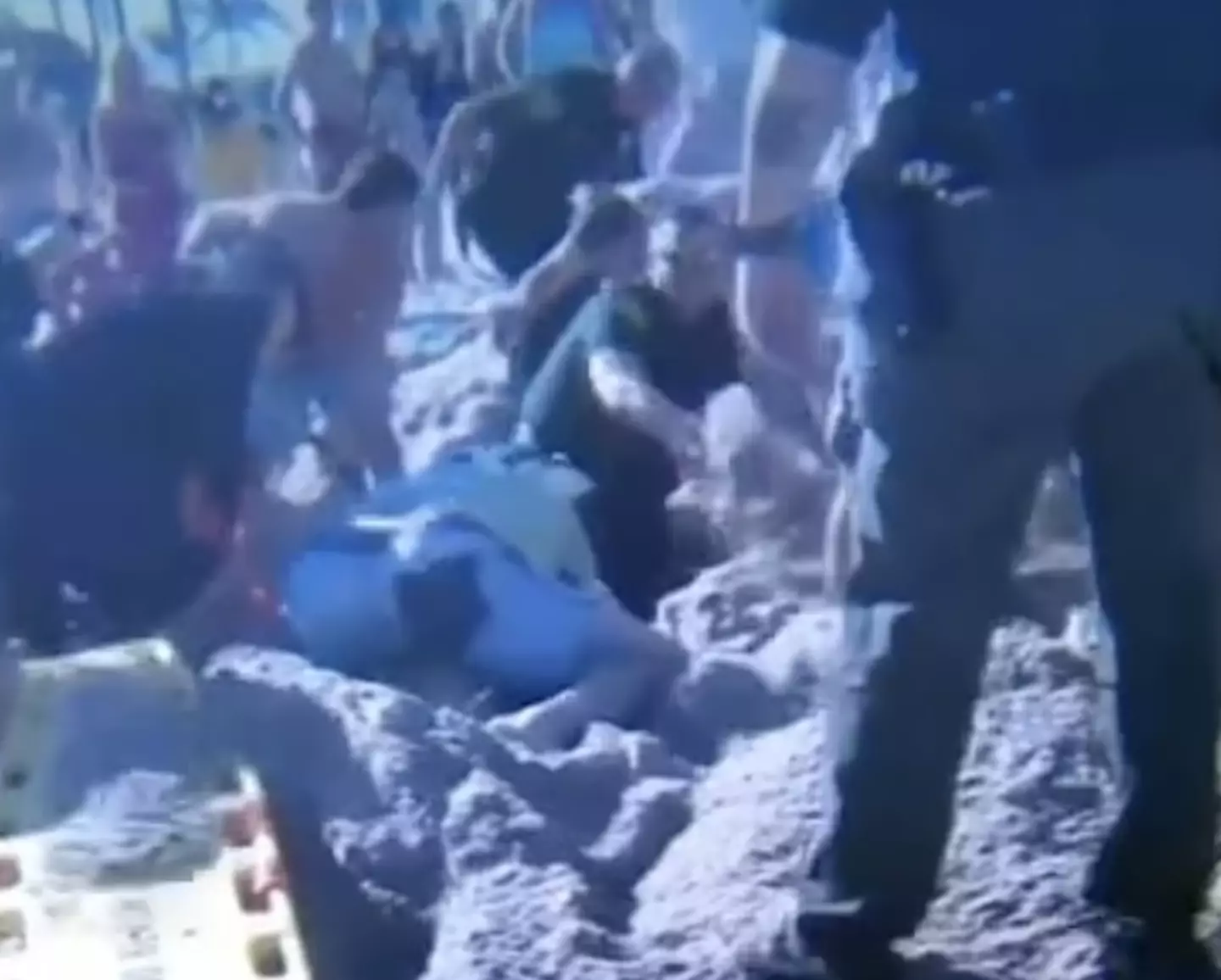 Footage from the scene shows bystanders and the emergency services trying to dig the children out.