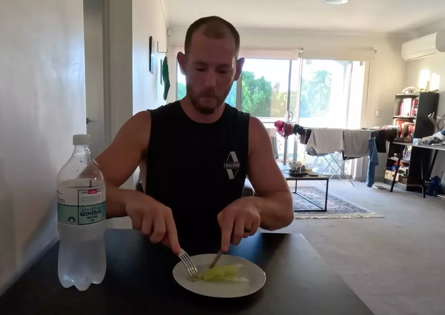 The YouTuber struggled to sustain himself with a few lettuce leaves (YouTube/Aventura Australia)