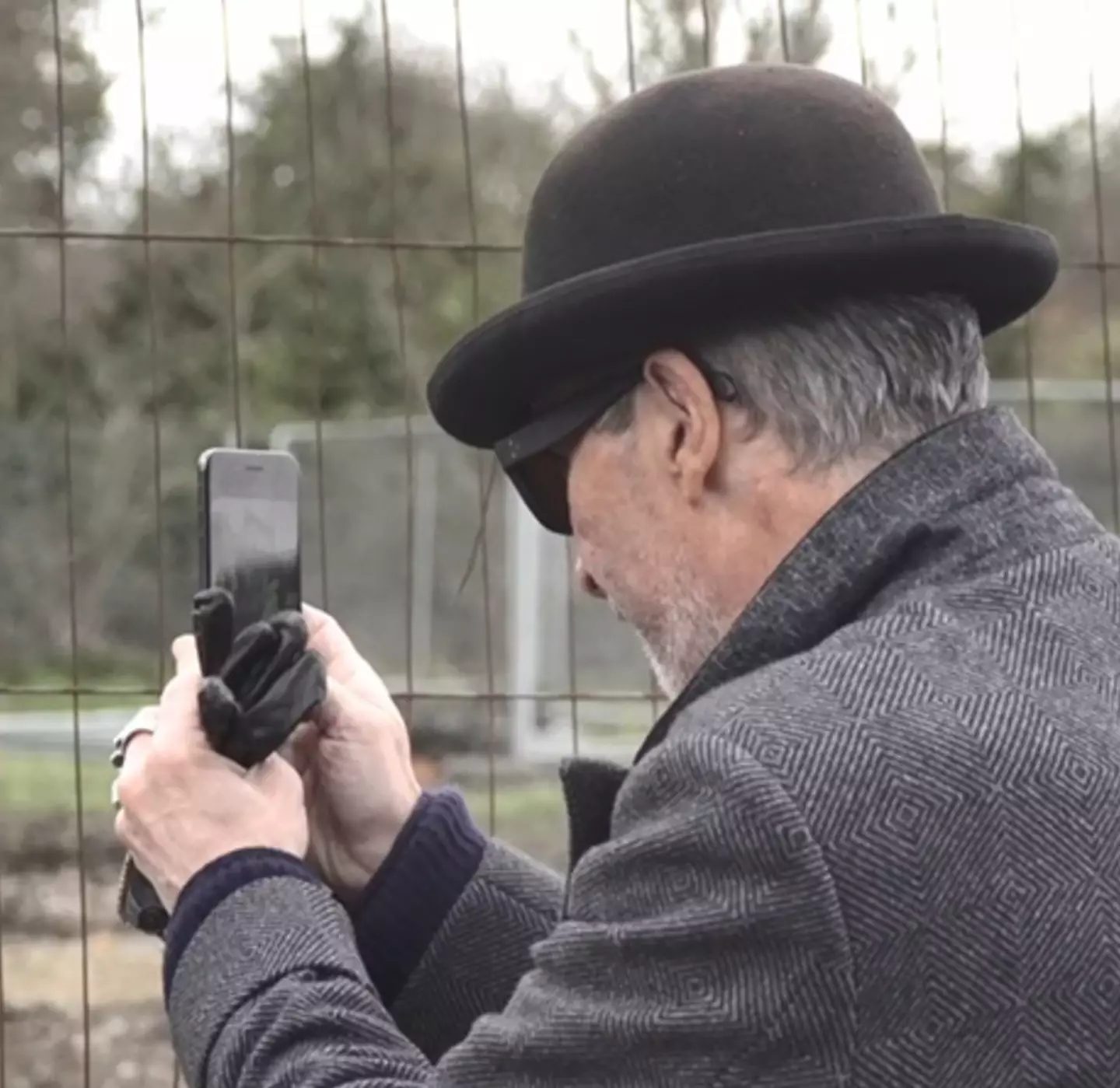 The man was spotted wearing a bowler hat.