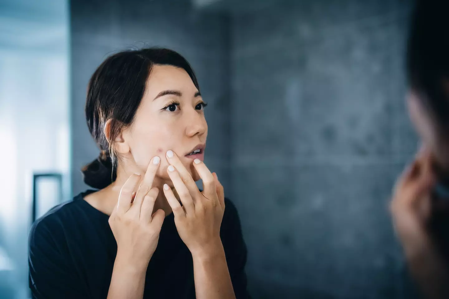 The 'danger triangle' pretty much spans from the bridge of the nose down to the corners of the mouth (Getty Stock Images)