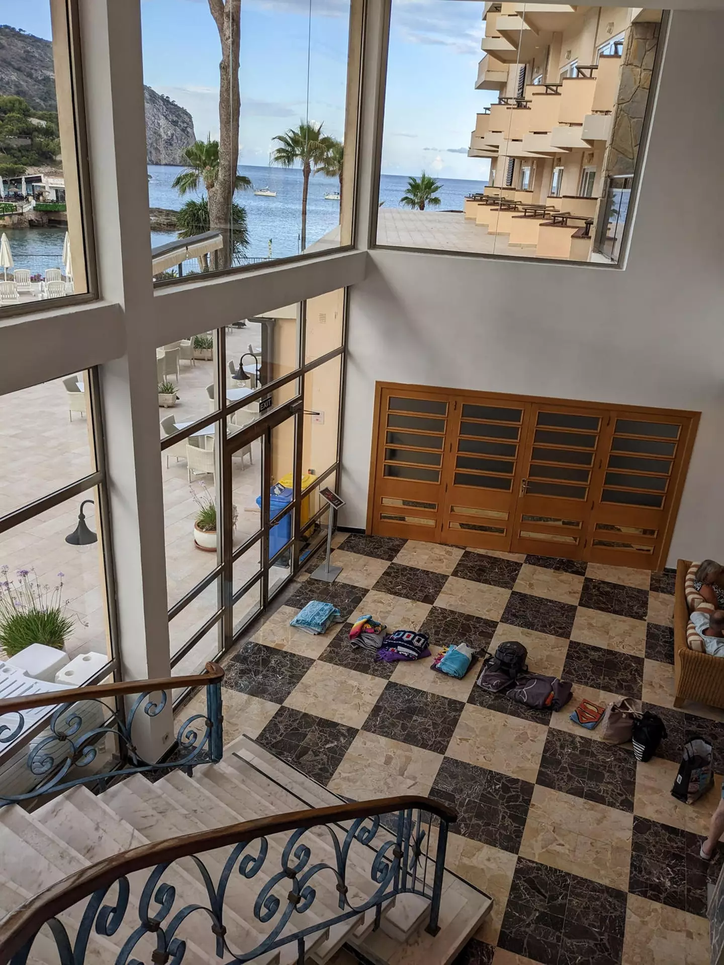 A holidaymaker says it's 'crazy behaviour' as others place their towels in an ordered queue for the sun beds.