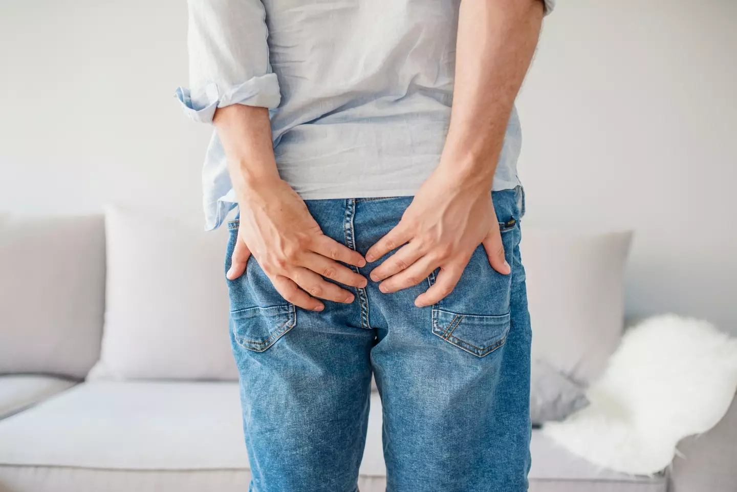 A doctor has explained the reason why we randomly get shooting pain in our bums. (Getty Stock Images)