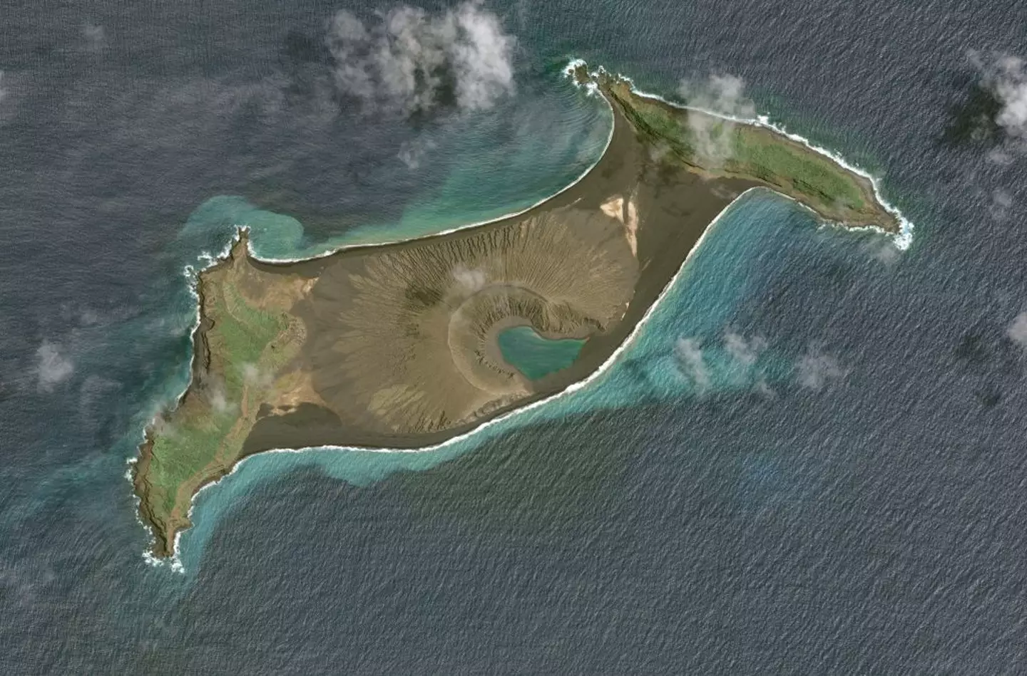 Before the huge eruption ripped the island apart (Maxar via Getty Images)