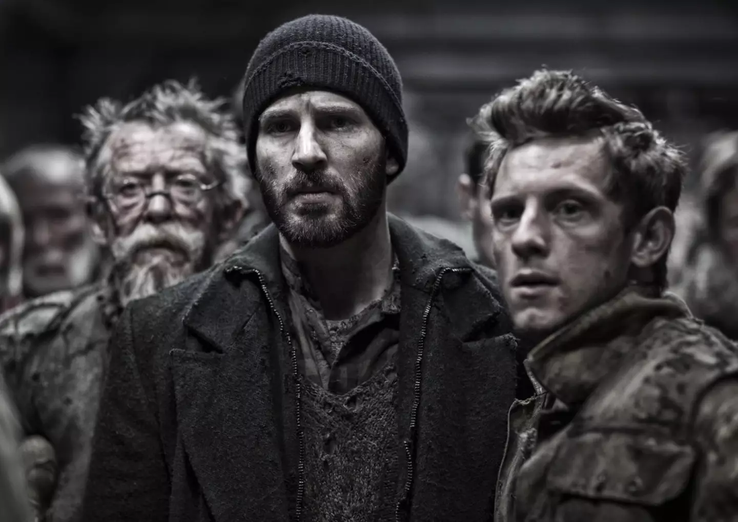 L-R: Chris Evans, John Hurt and Jamie Bell in the sci-fi film.