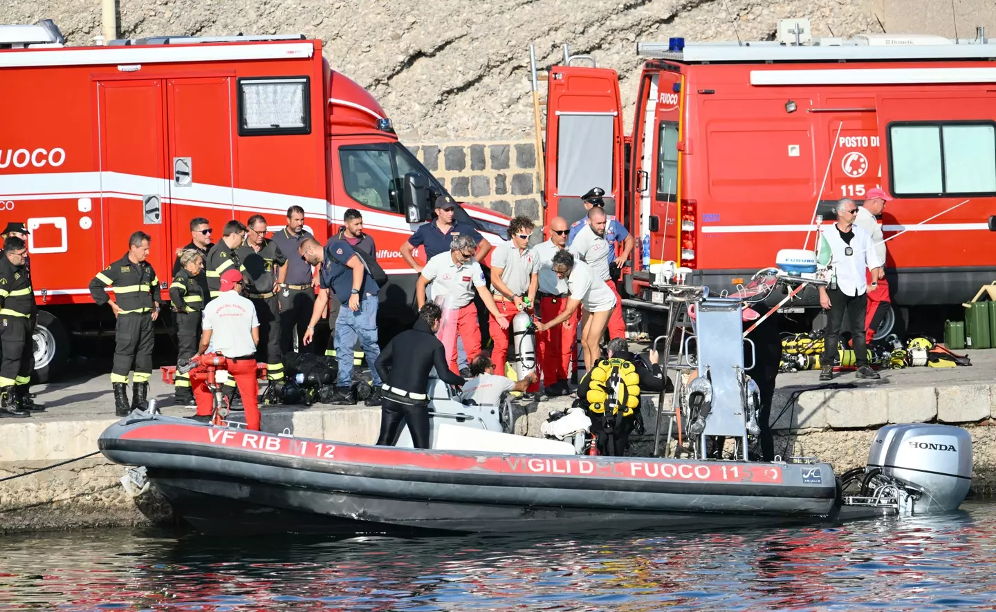 The search for the six missing passengers continues. (ALBERTO PIZZOLI/AFP via Getty Images)