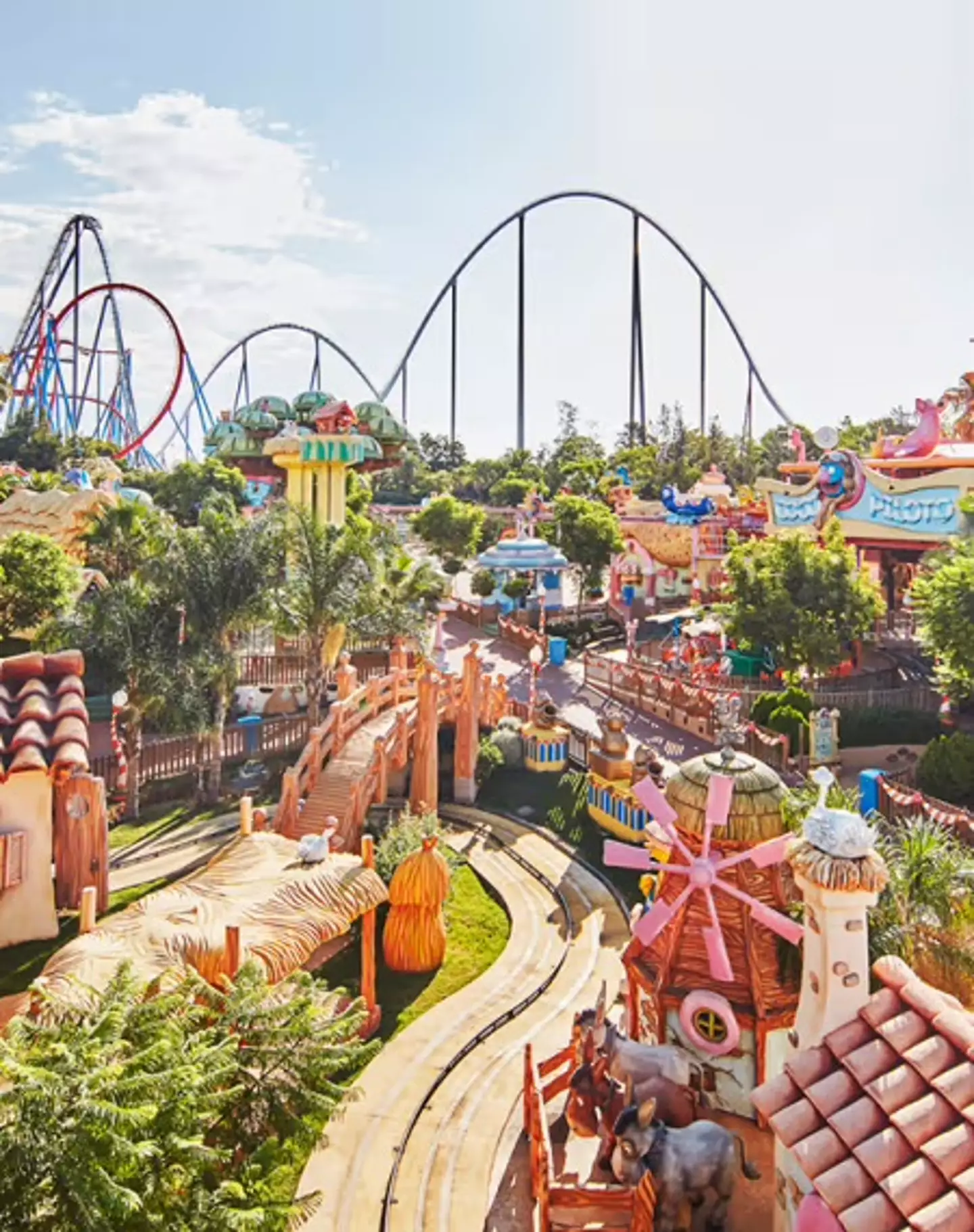 More than a dozen people have been injured after a tree fell onto a rollercoaster at a theme park in Spain.