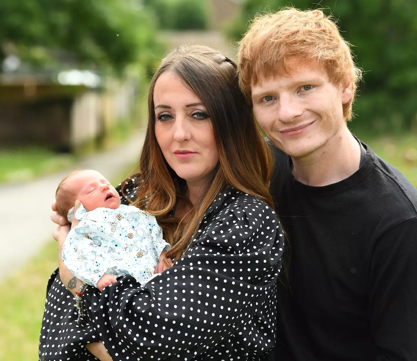 The couple are besotted by their newborn.
