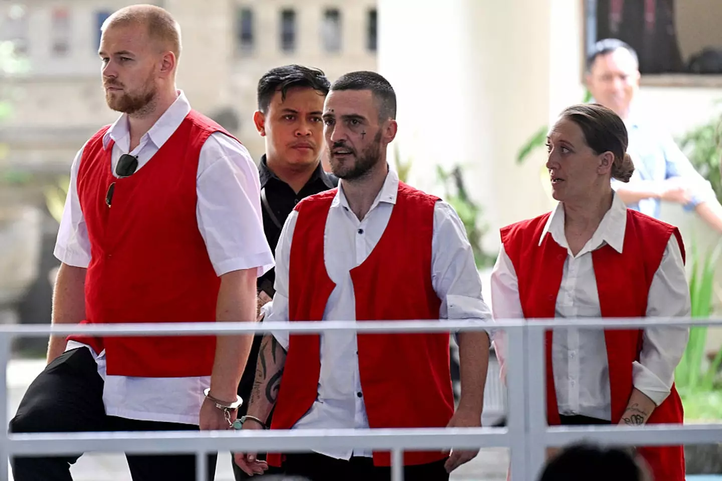 Jonathan Collyer, 38, Phineas Float, 31, and Lisa Stocker, 39, could face the death penalty if convicted (SONNY TUMBELAKA/AFP via Getty Images)