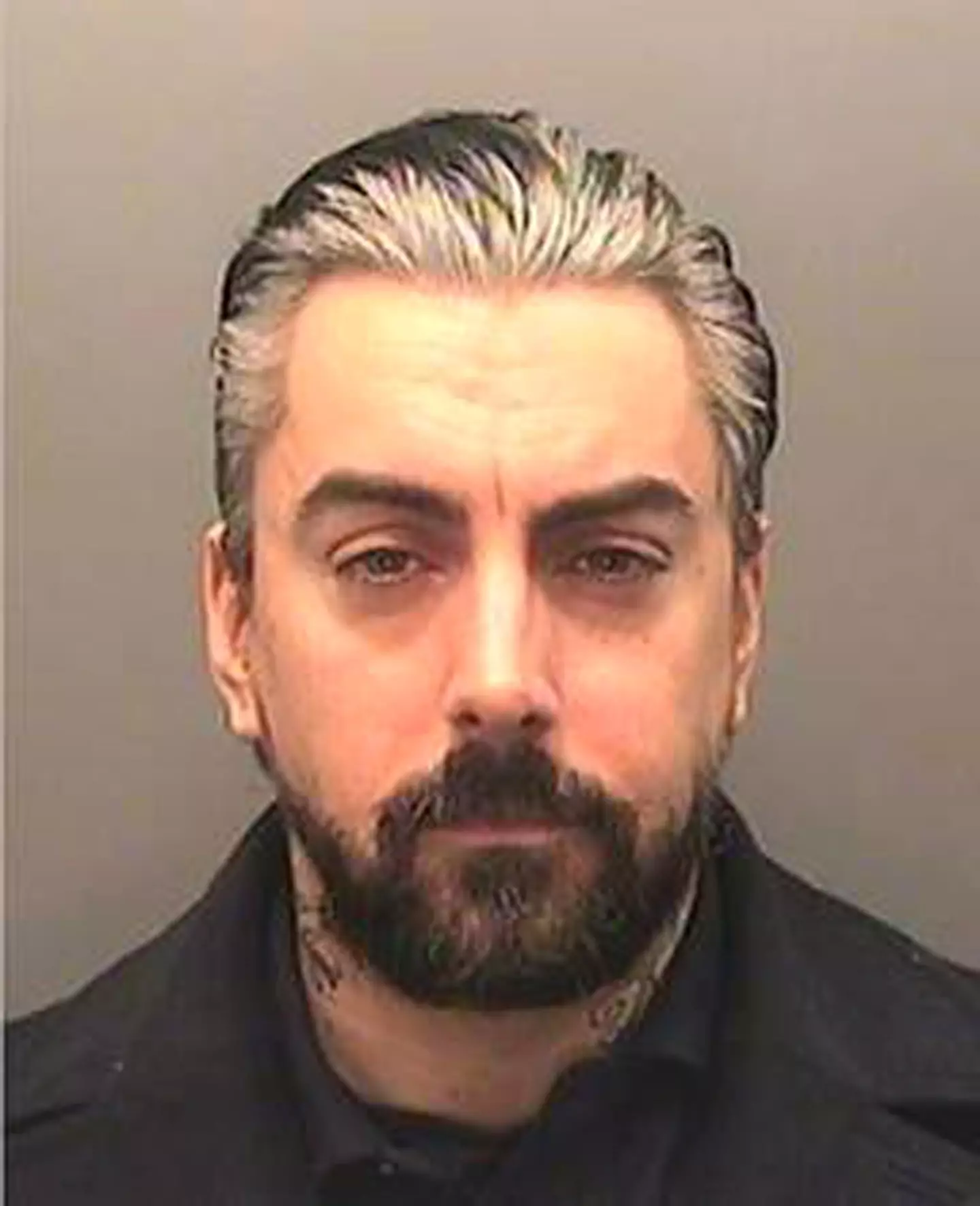 Ian Watkins was stabbed to death in prison, two men have been charged (PA)