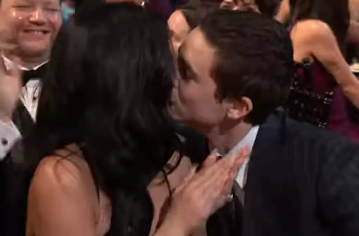 The pair shared a kiss as Chalamet's name was announced. (E!)