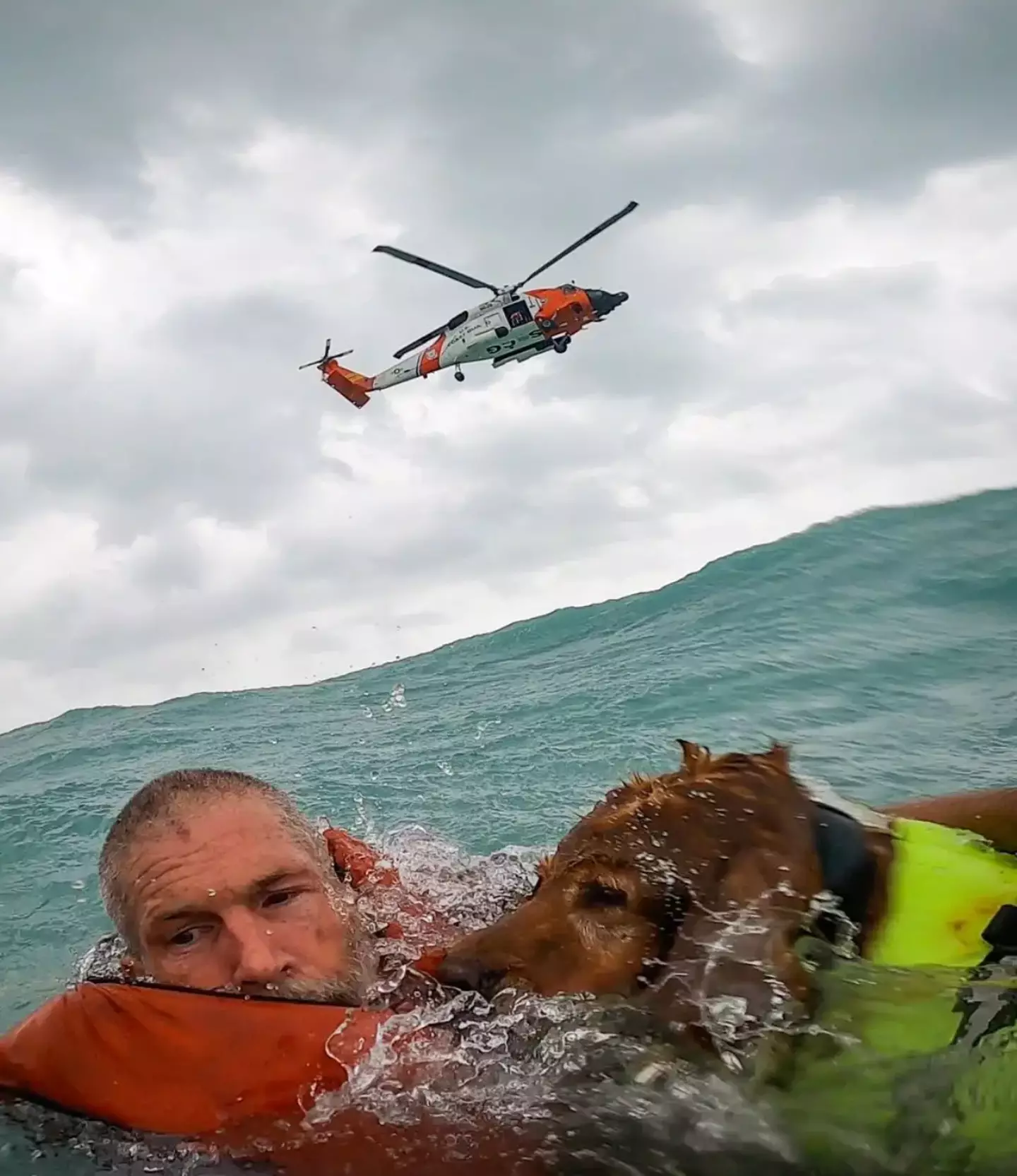 The two took a leap of faith before being rescued (USCGSoutheast)