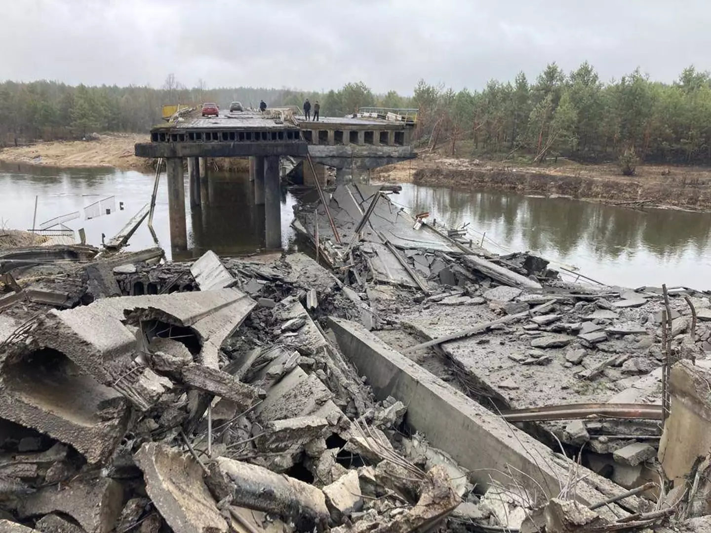 The first photo showed a bridge allegedly destroyed by Russian forces.