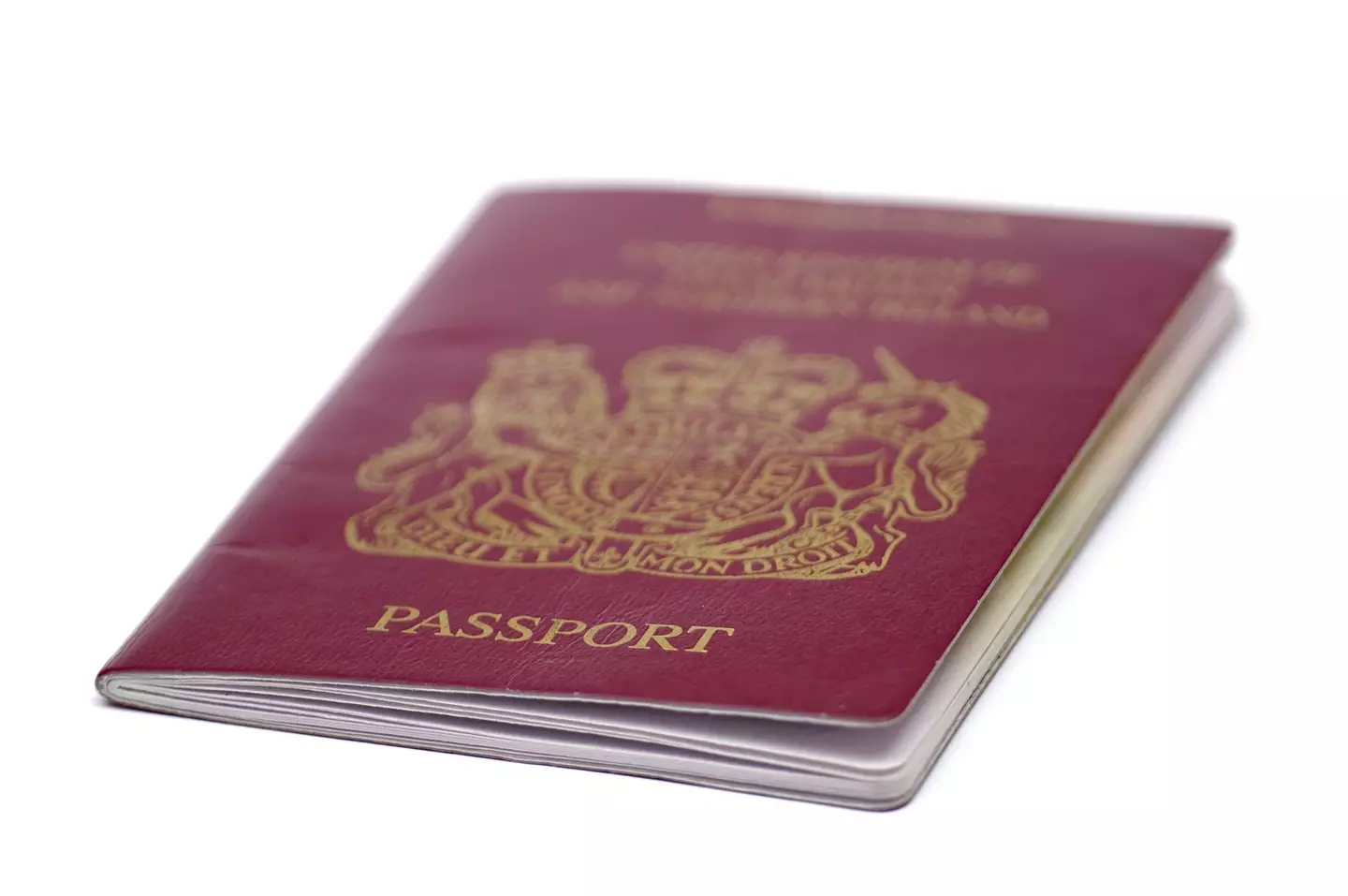 The old-style UK red passport.