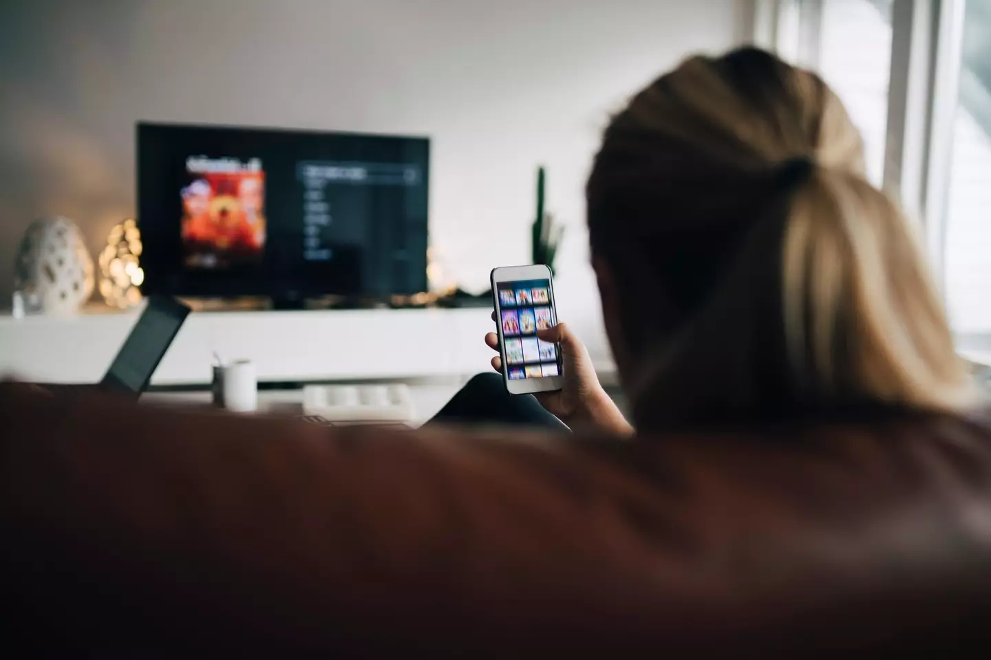 People nowadays like to have two things on at once (Getty Stock Photo)