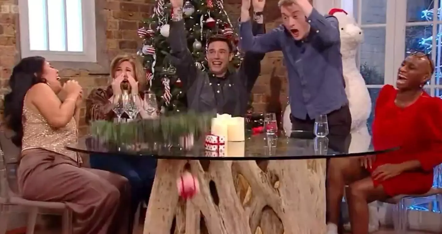 He flipped the festive wreath that was on the table, sending presents flying across the room (BBC)