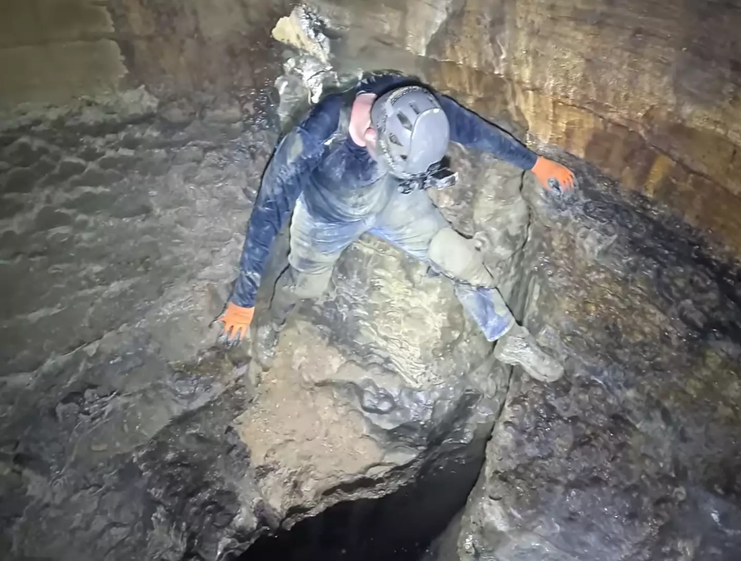 Cave explorers have to rely on insane leap of faith to cover massive chasm below 1 Not the best position someone could be caught in. (YouTube/ActionAdventureTwins)