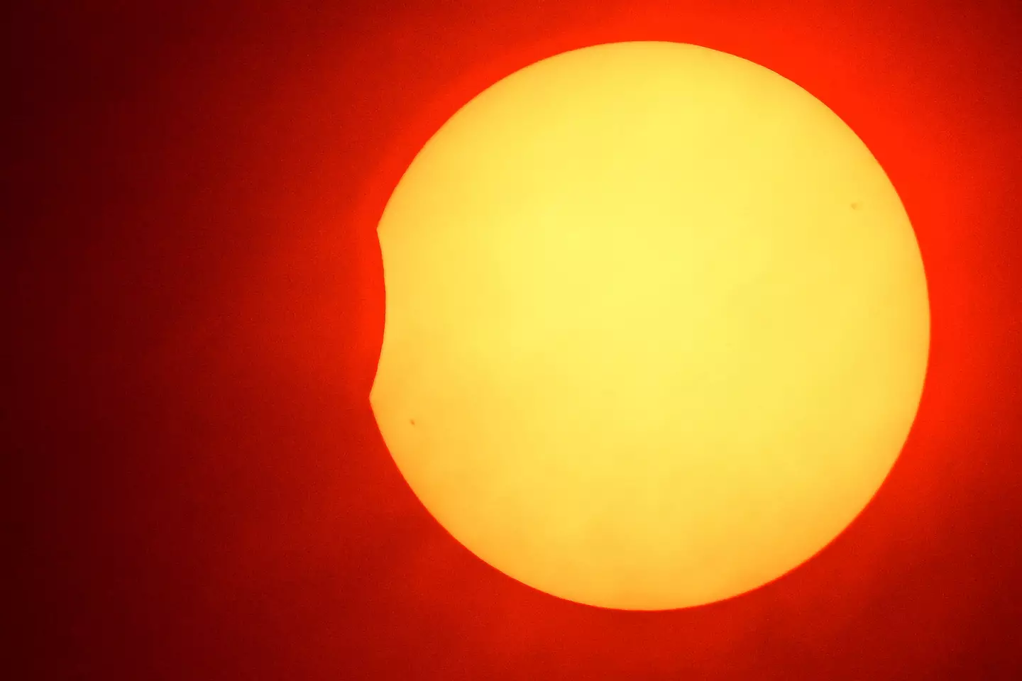 A partial solar eclipse in Hede-Bazouges, western France on 25 October 2022.