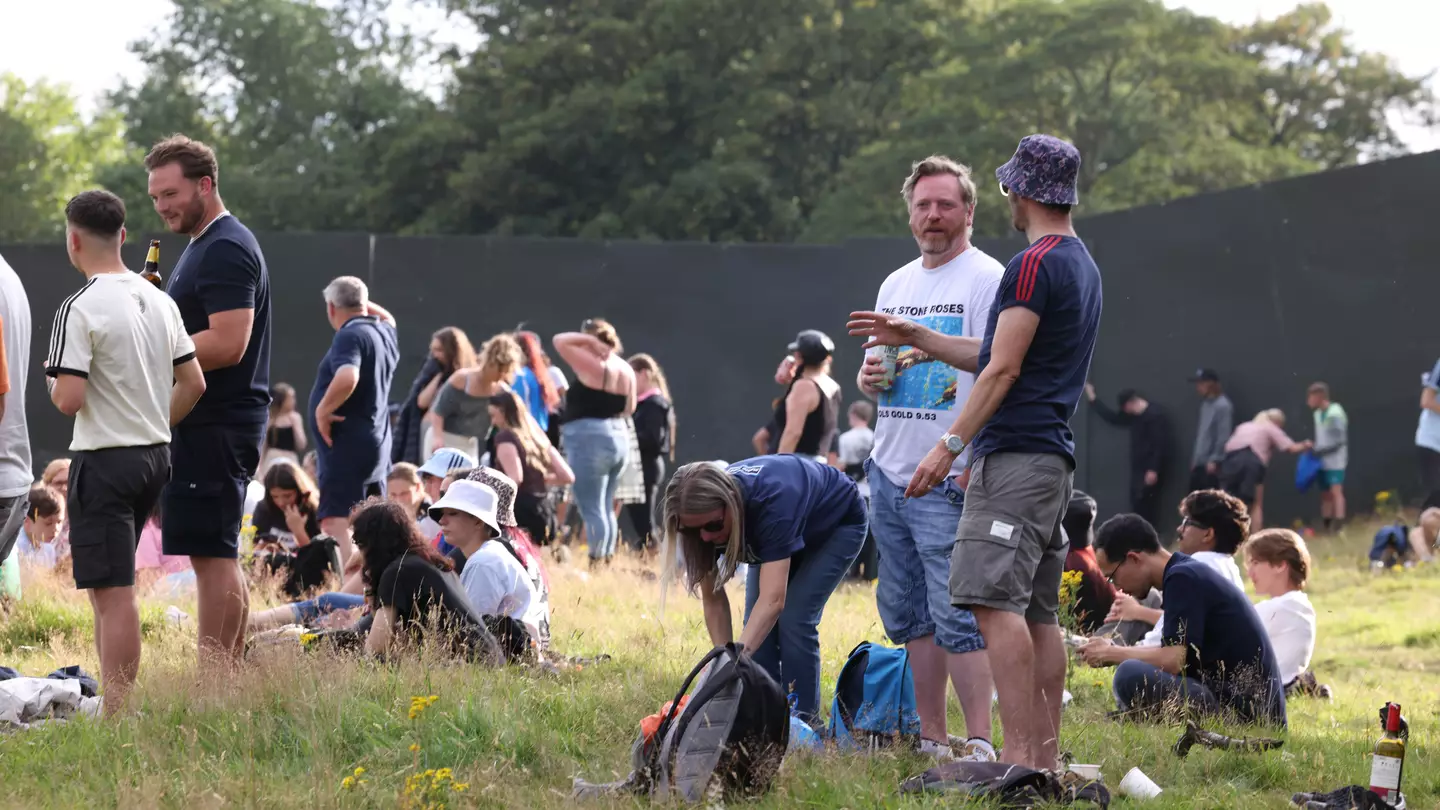 Hundreds of ticketless Oasis fans ignore huge fence put up on ‘Gallagher Hill’ despite desperate plea from organisers
