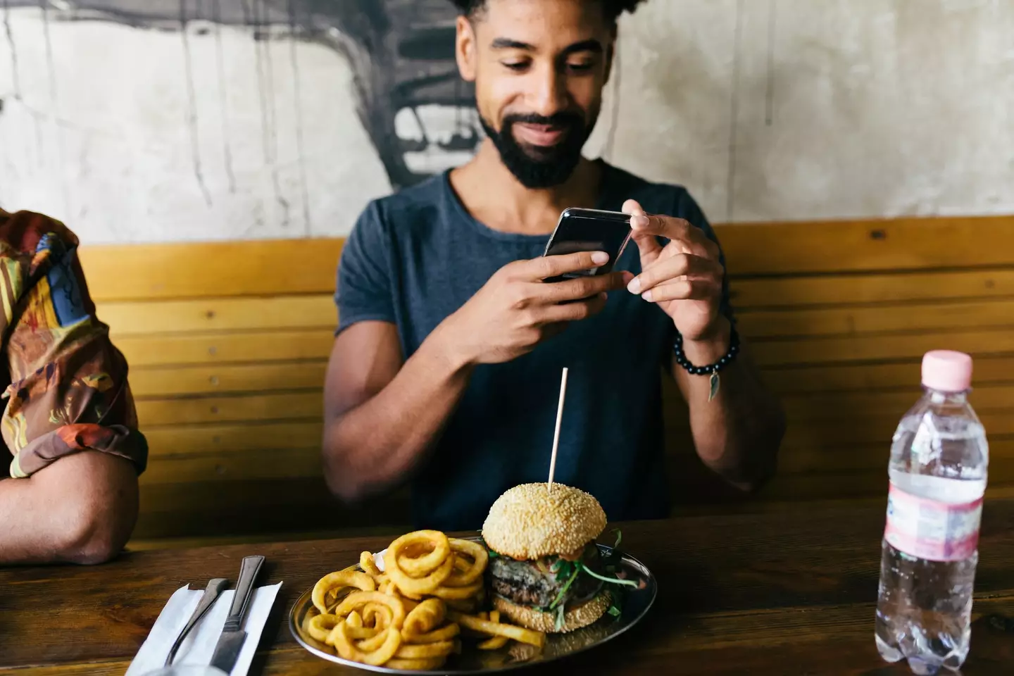 A phone ban at the dining tables? Carnival has no plans (Getty Stock Images)