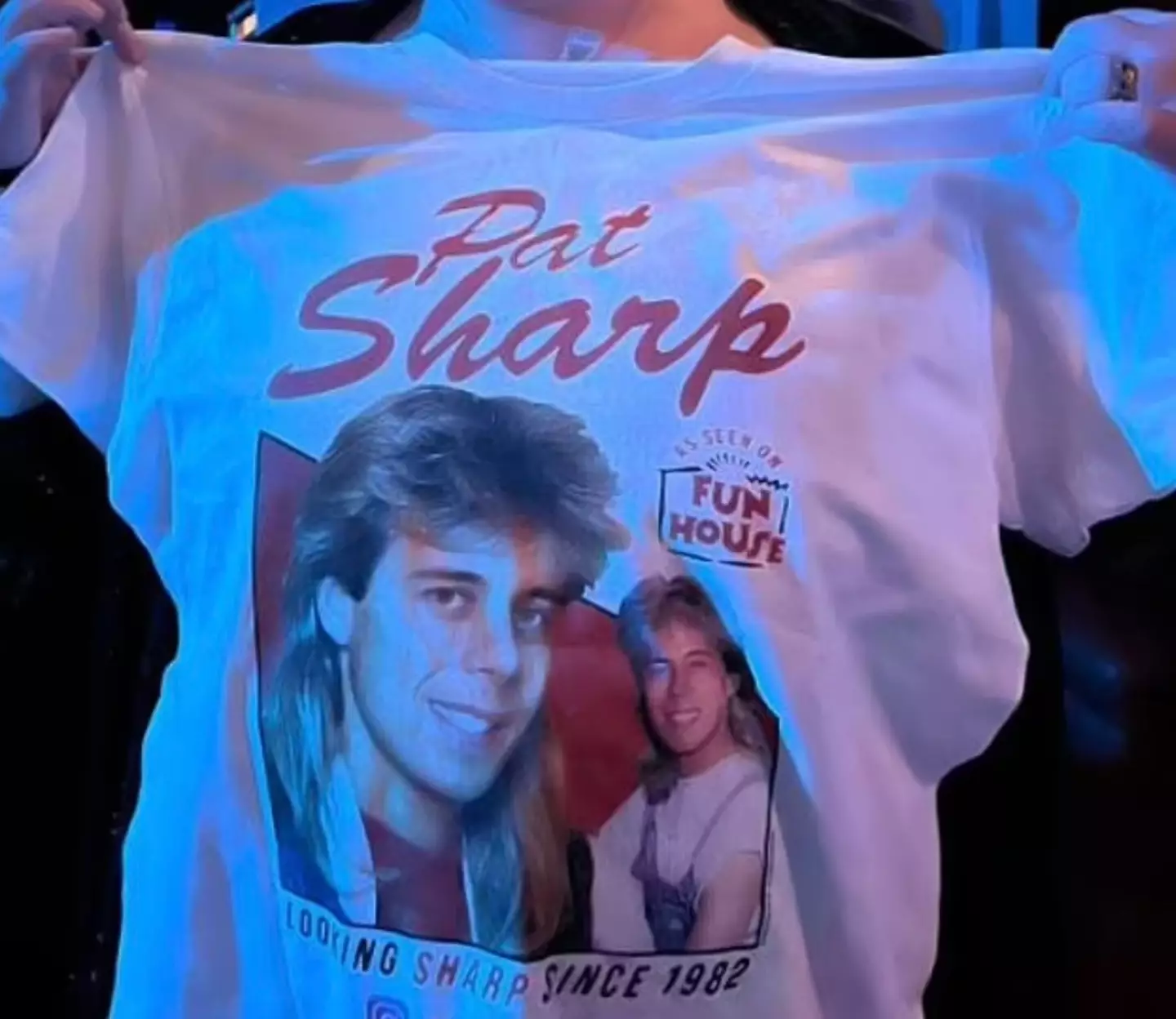 Pat Sharp gifted the woman a t-shirt.