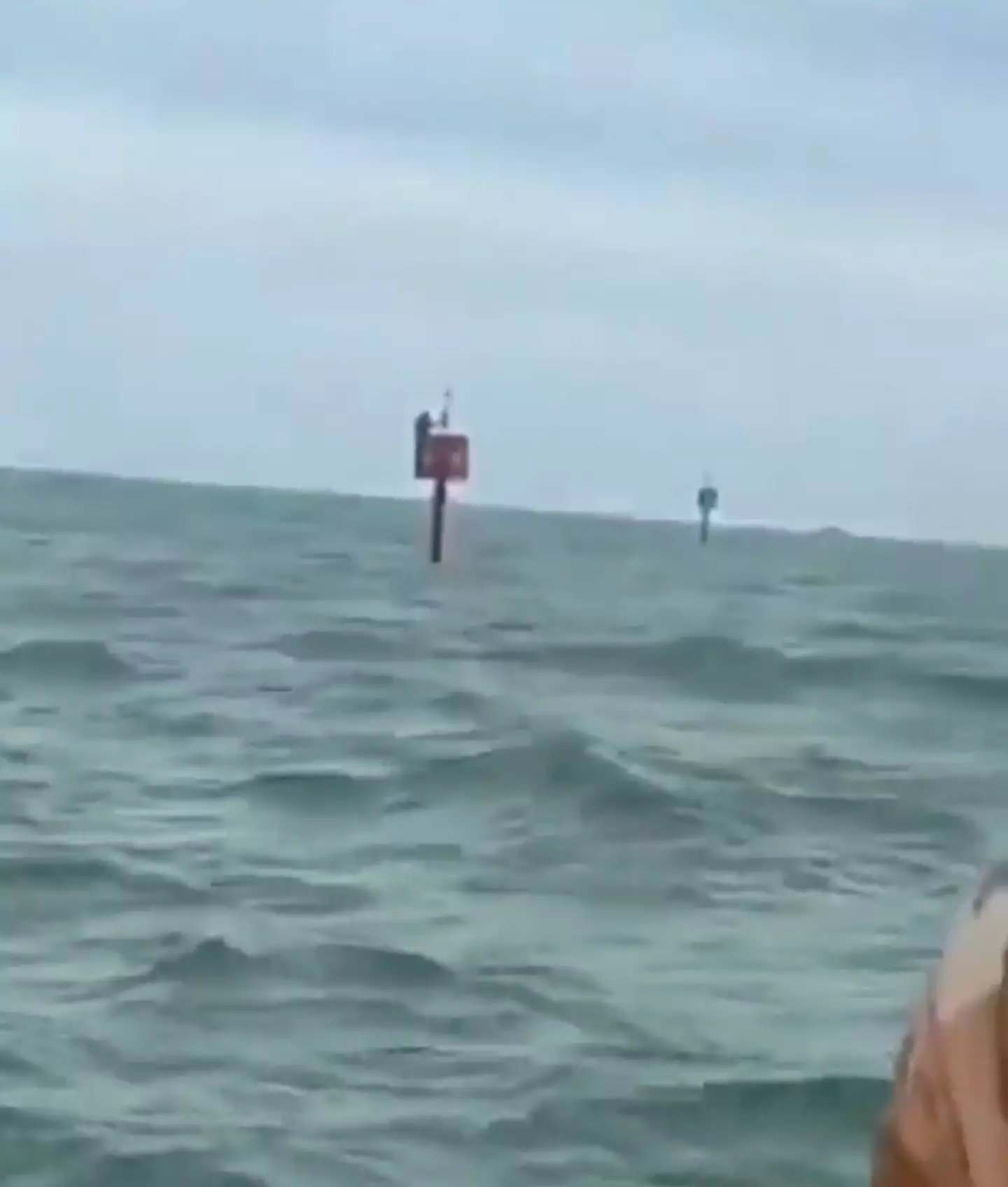 David Soares survived by holding on to a signal buoy.