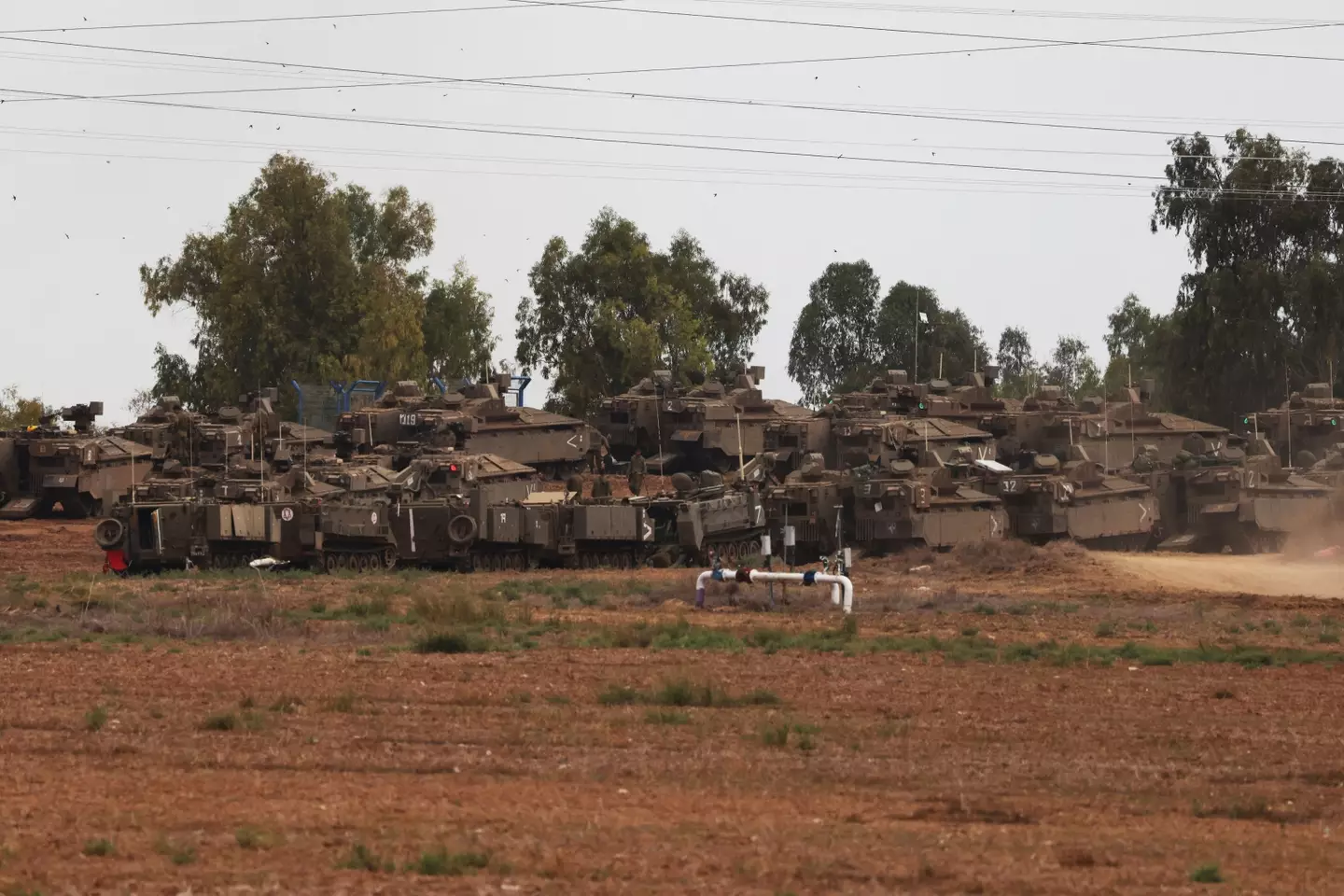 Israeli army reinforcements positioned near the city of Sderot, which is close to the border with the Gaza Strip.