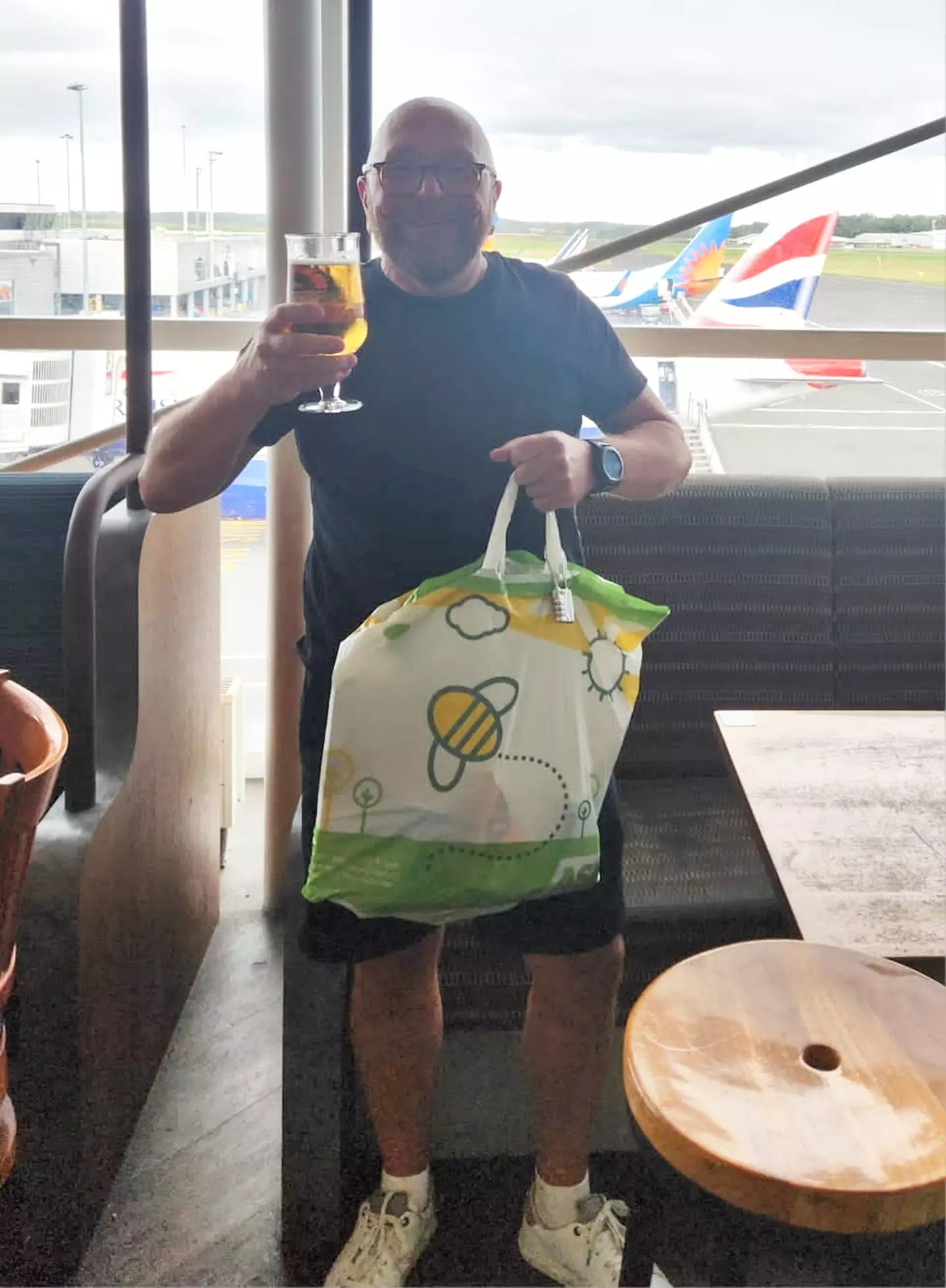The party-loving dad flew out with just an Asda carrier bag.