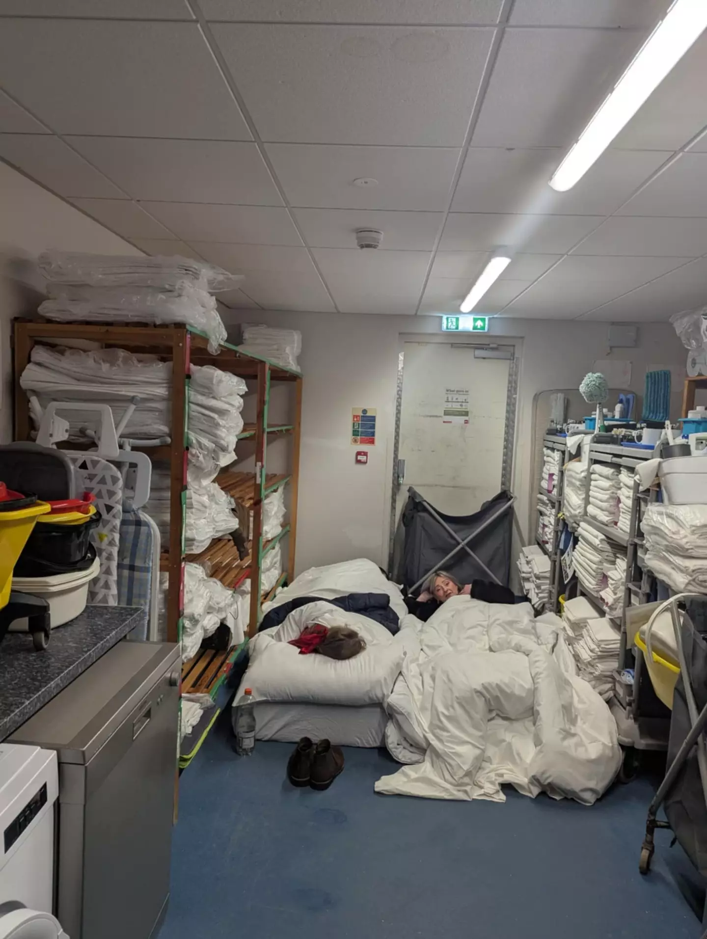 With no empty rooms in the hotel and the family not able to take the offer of another hotel, they were put up in the laundry room. (Kennedy)